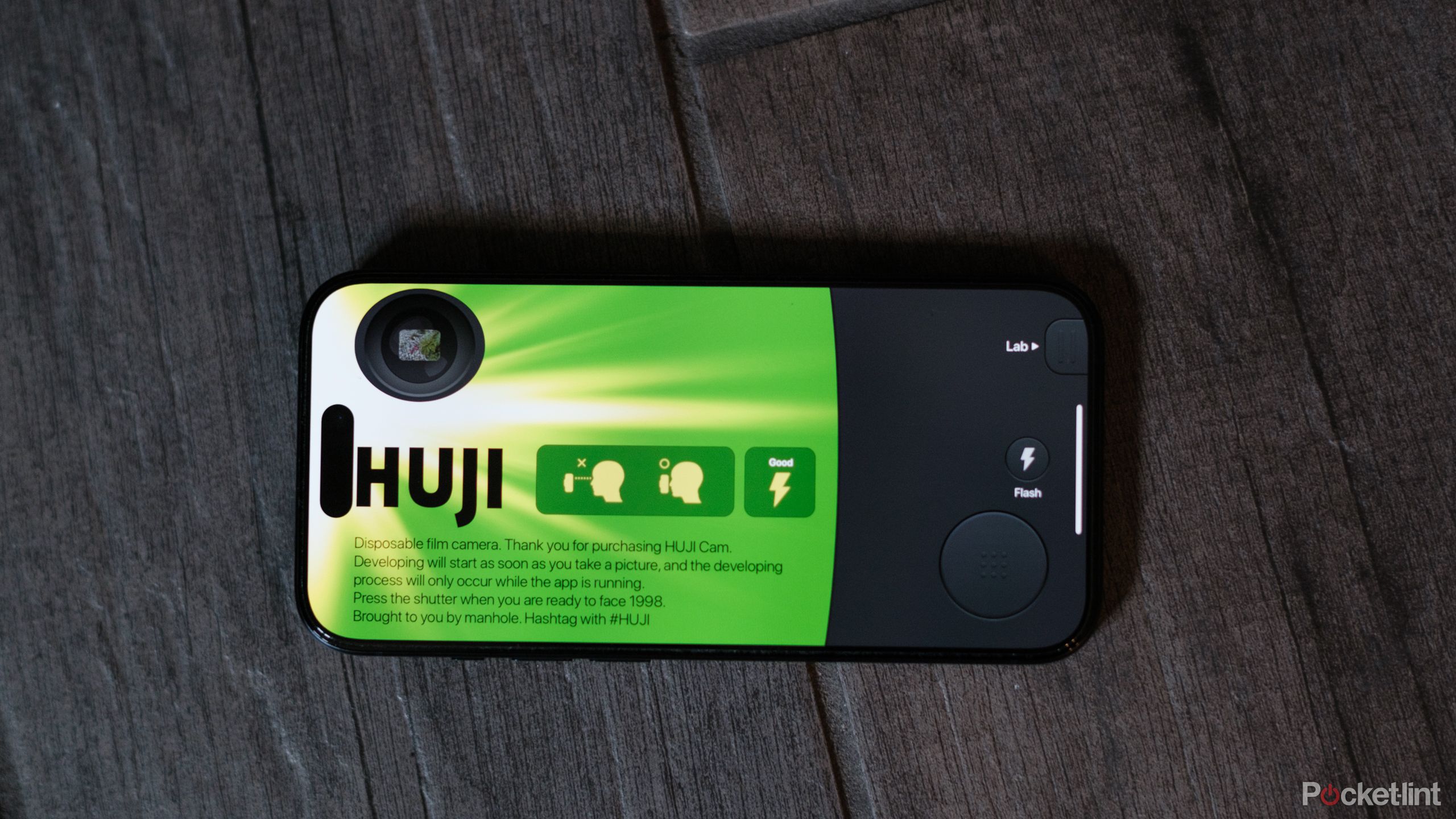 An iPhone displaying the Huji app