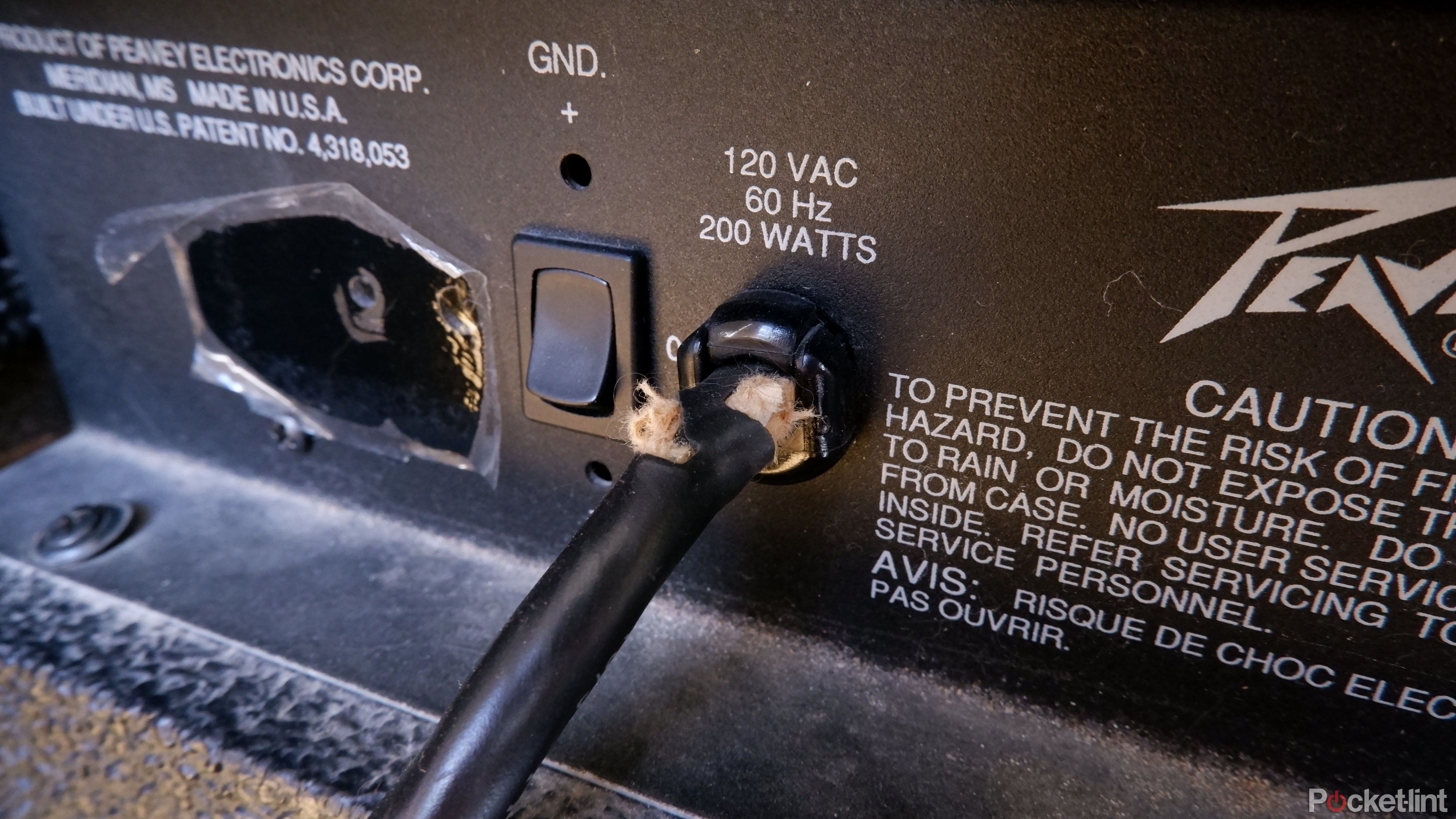 Frayed power cable on a Peavey amplifier