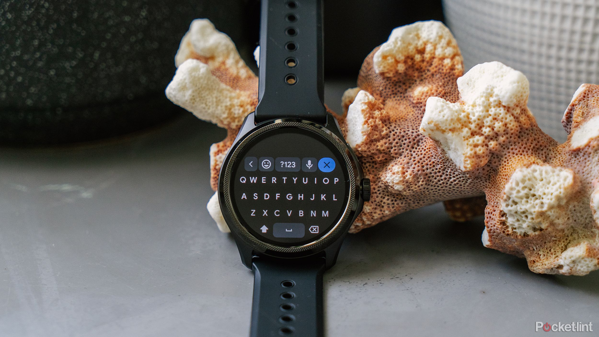 The Gboard app is displayed on the TicWatch Pro 5.