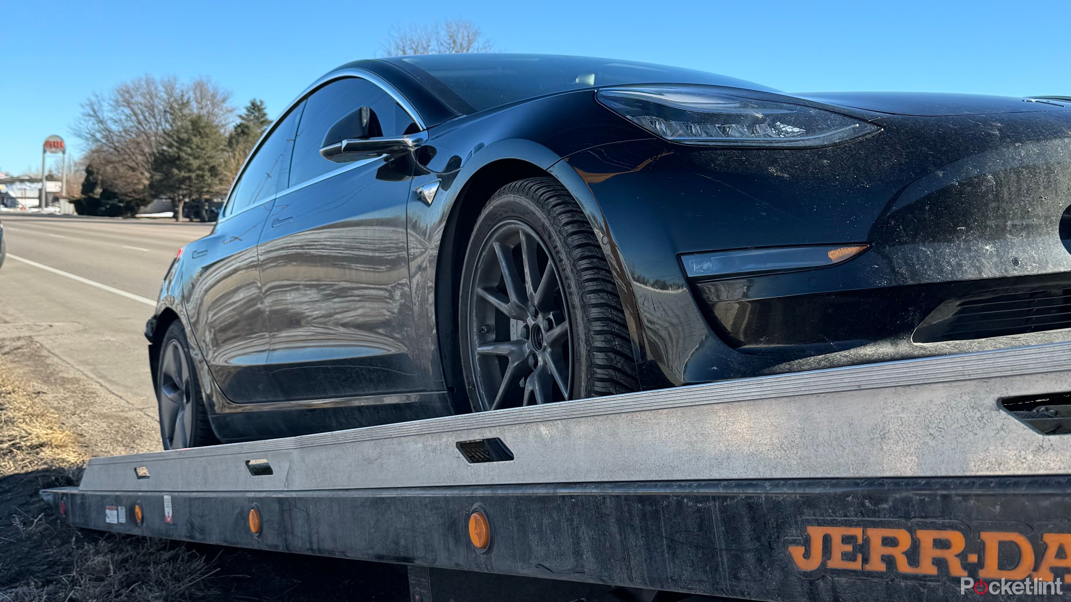 A Tesla on a tow truck