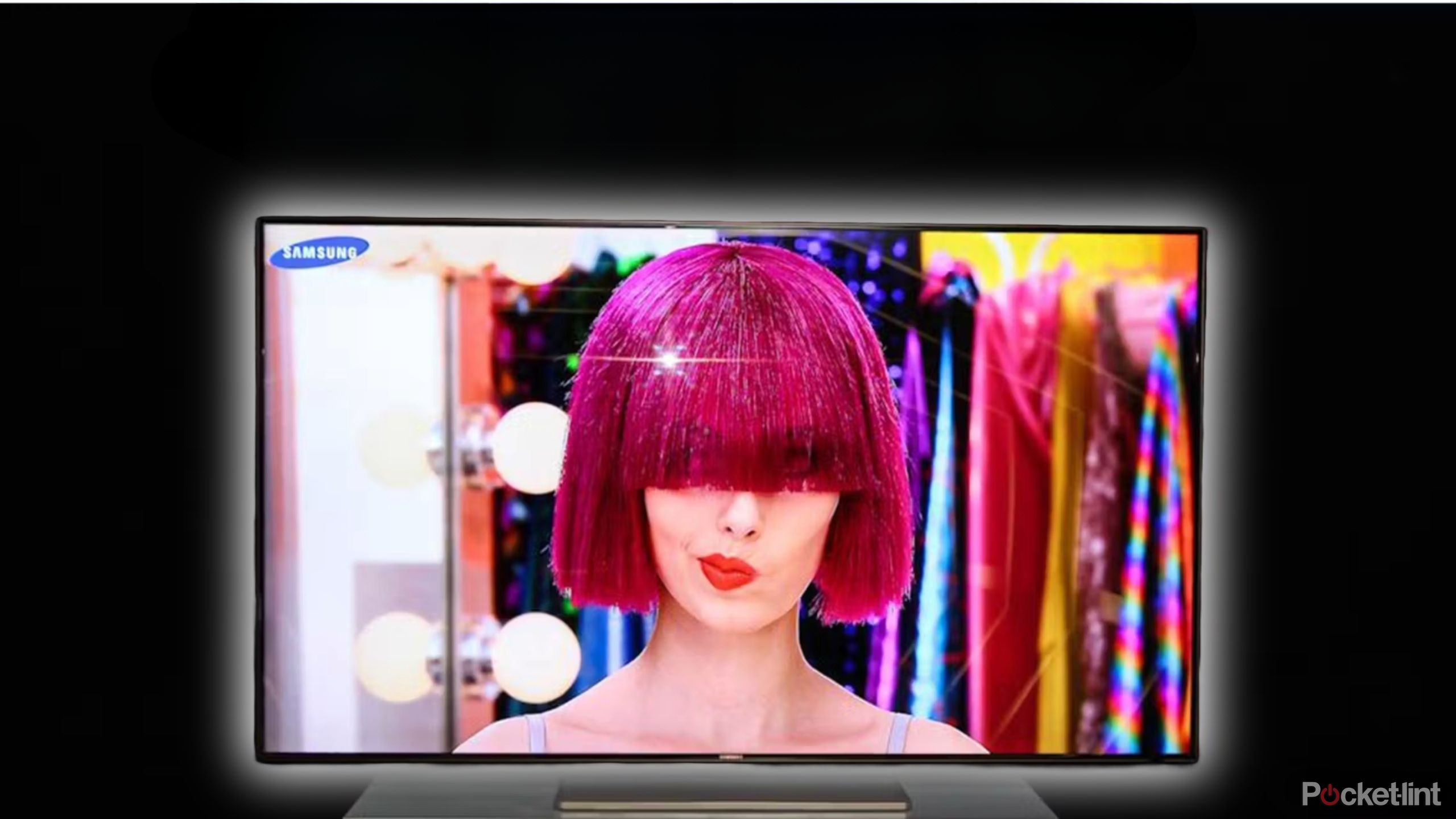 Samsung TV woman pink wig black background