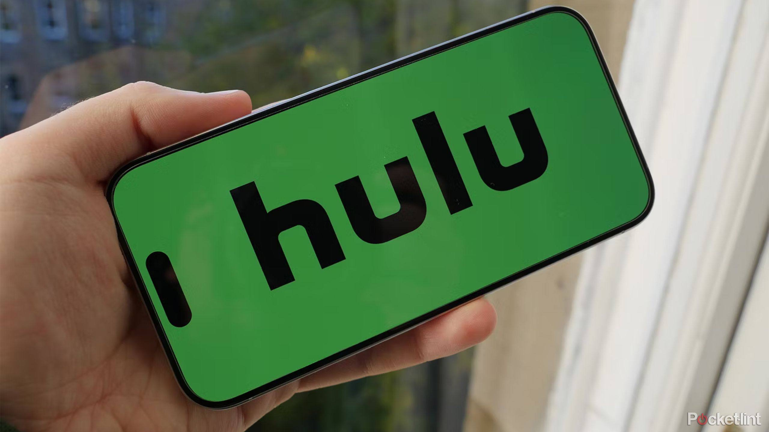Hulu logo on a phone being held landscape