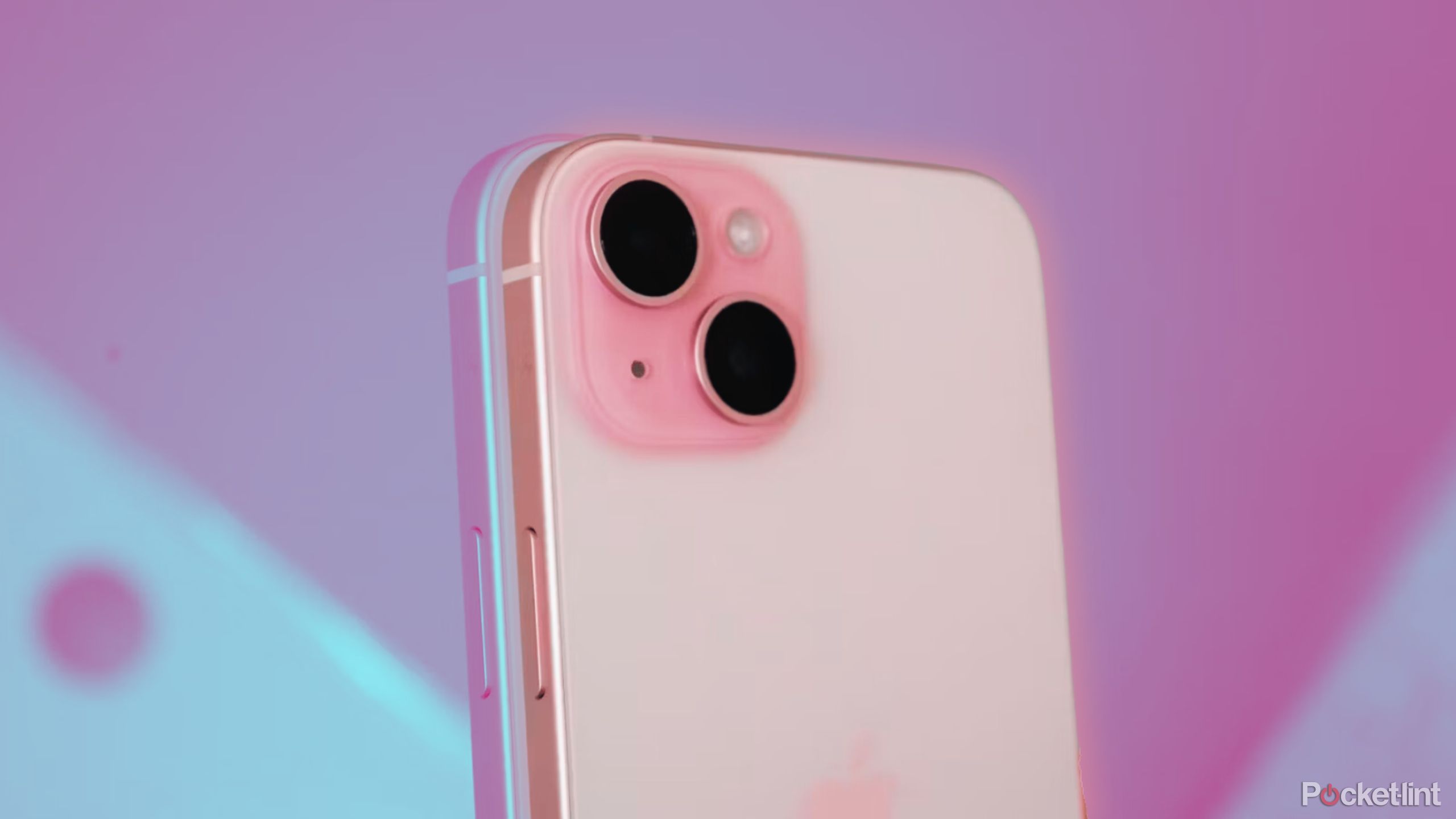 Apple iPhone 15 Plus against a pink and blue background.