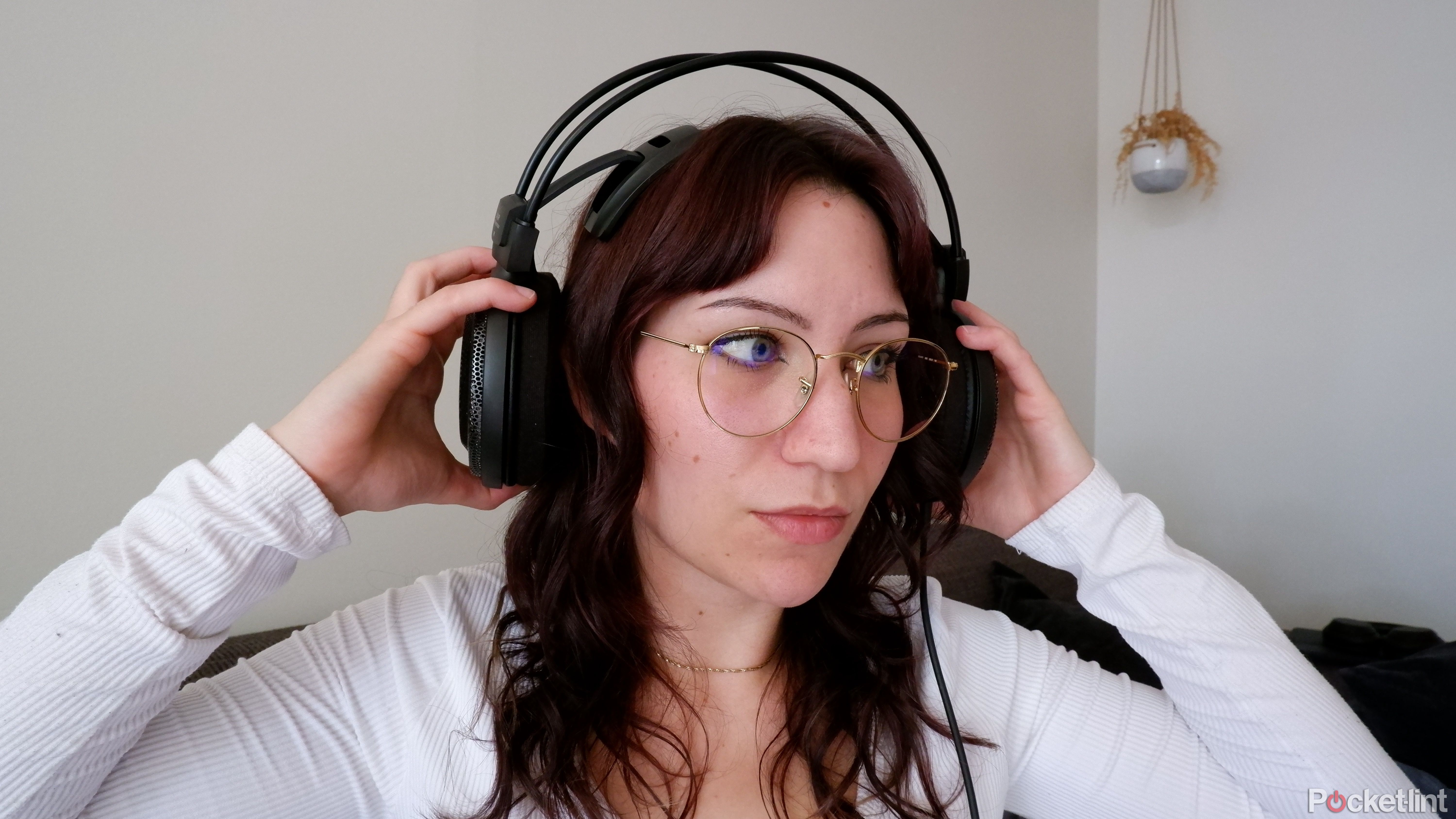 The author fitting the Audio-Technica ATH-AD700X on her head