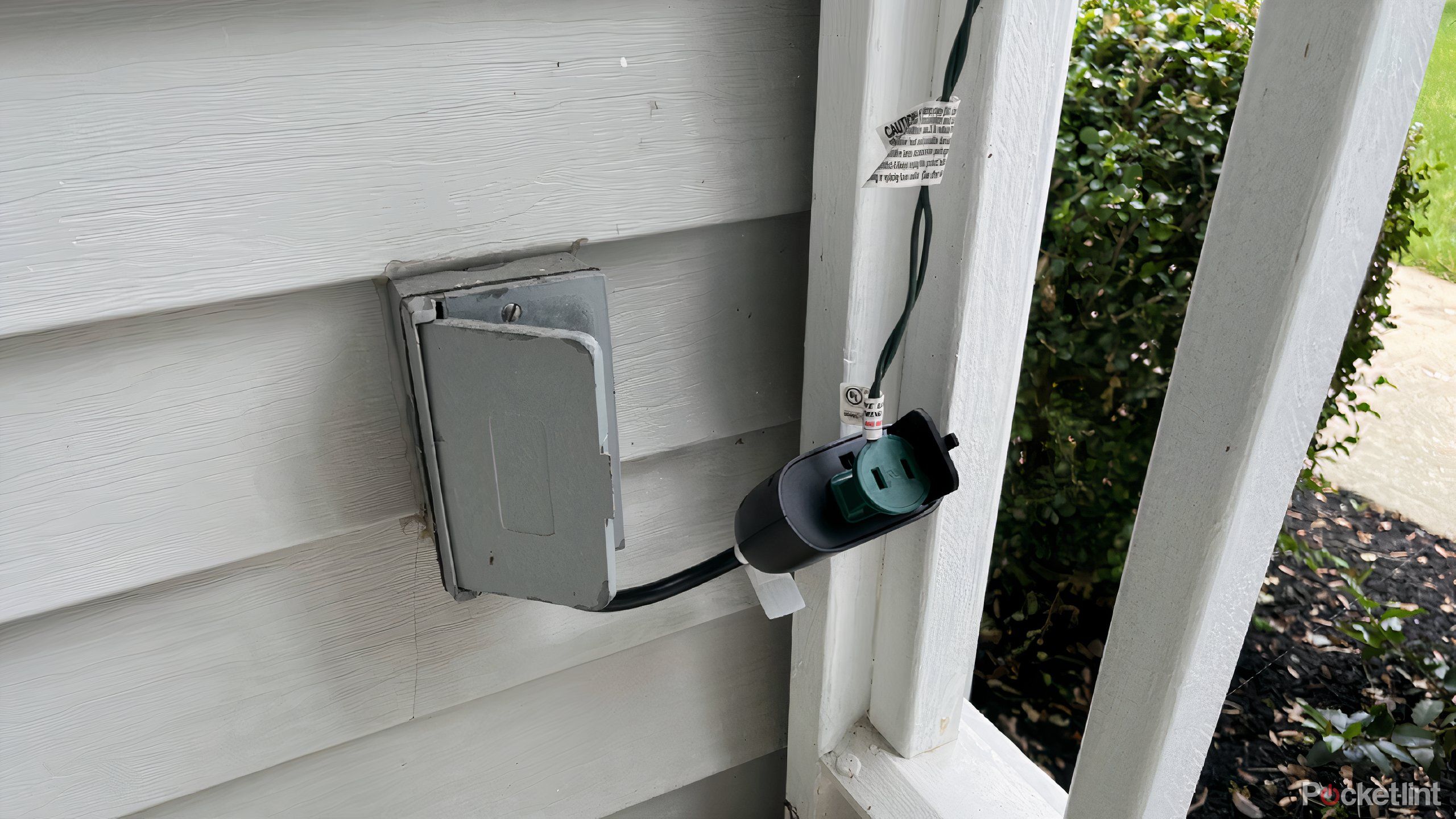 kasa outdoor smart dimmer plug plugged in outside