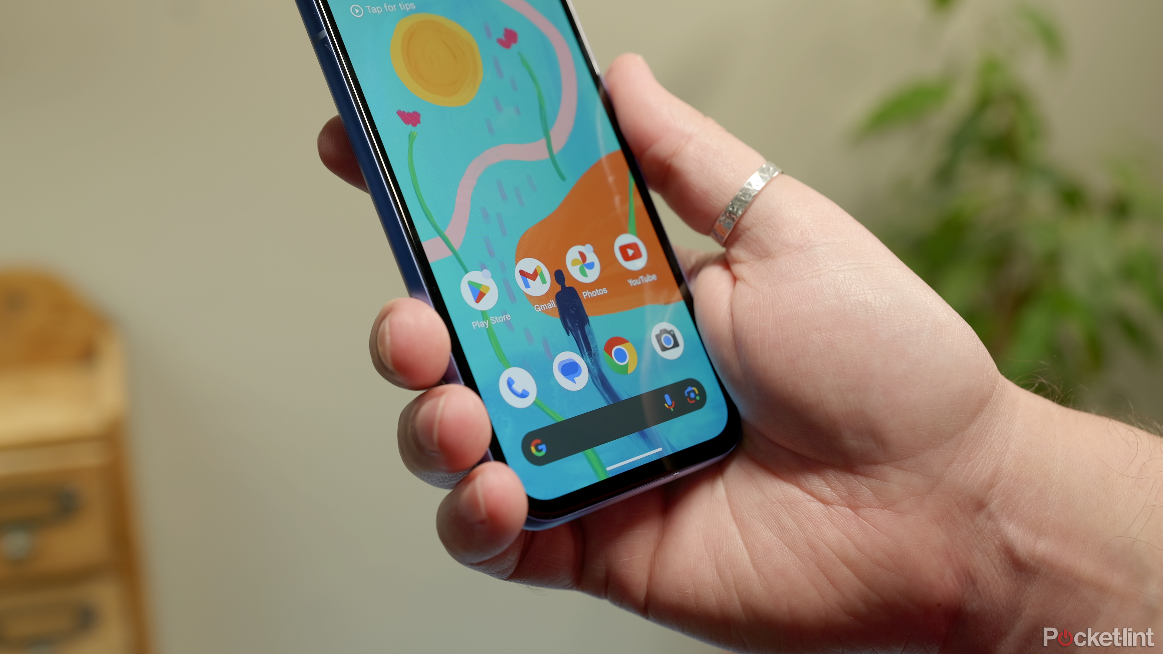 Pixel 8a - front - bottom bezel - in hand