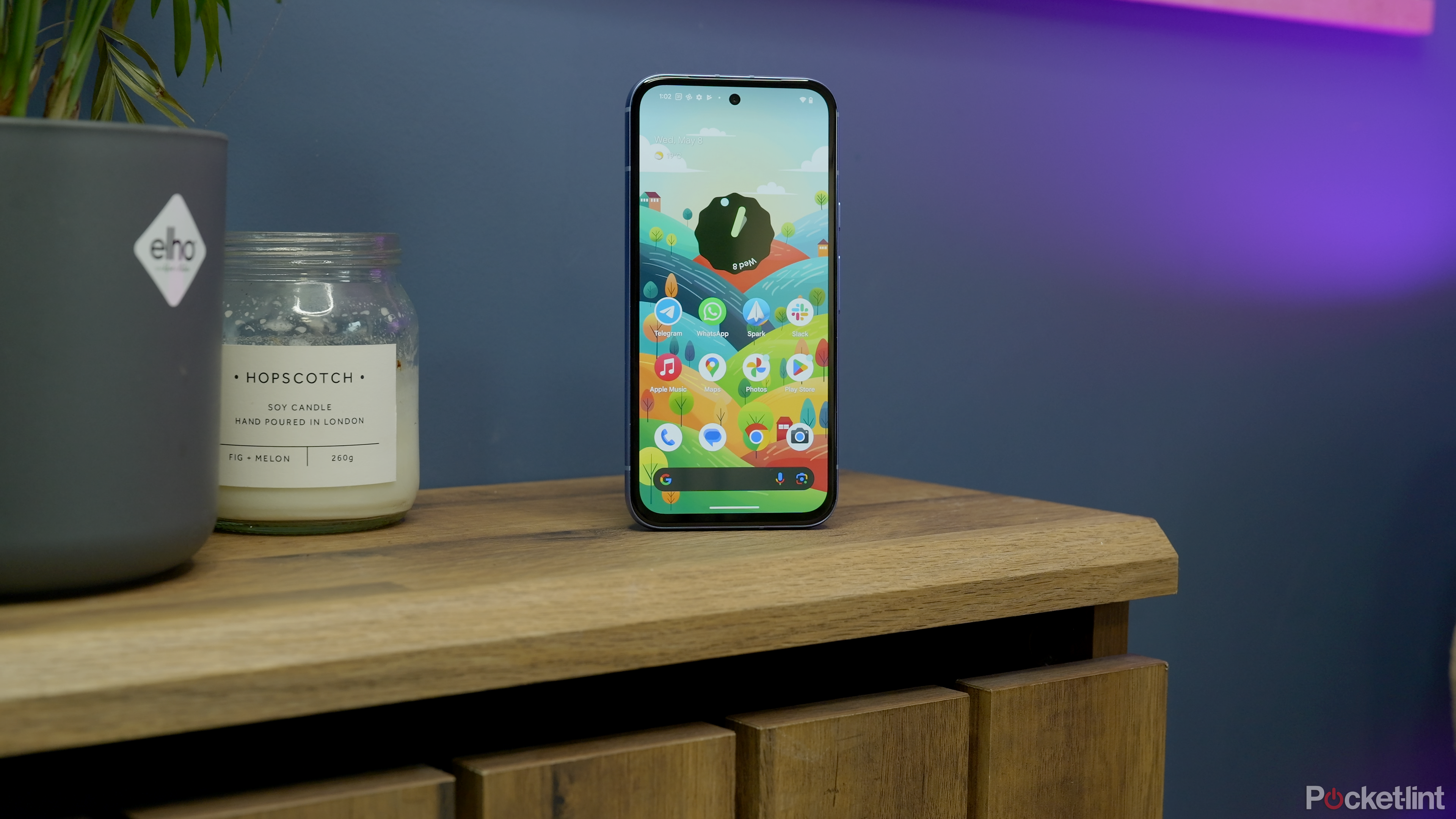 A Pixel 8a on a desk stand.