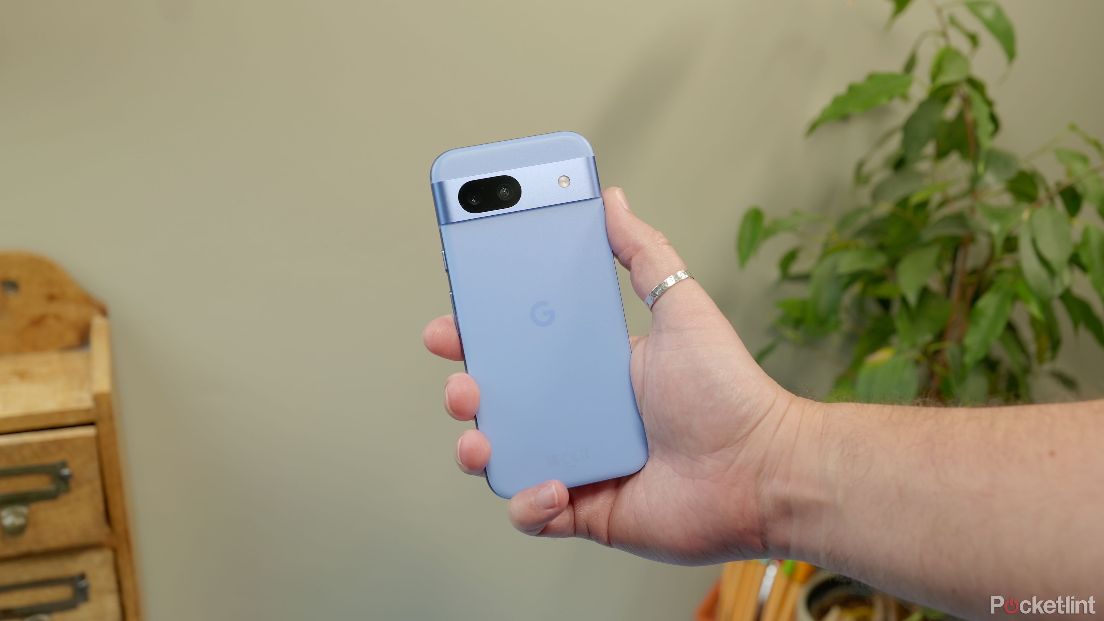 Pixel 8a - in hand - wide - back