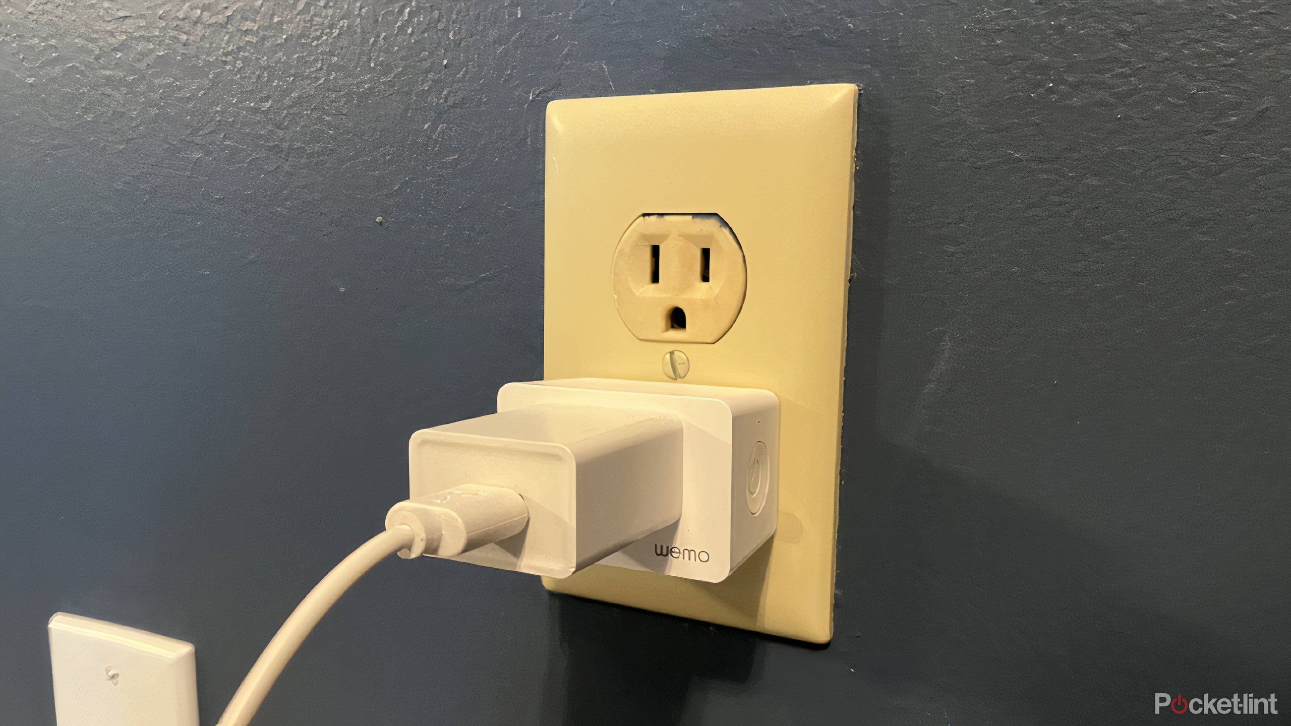 The Wemo smart plug in an outlet right side