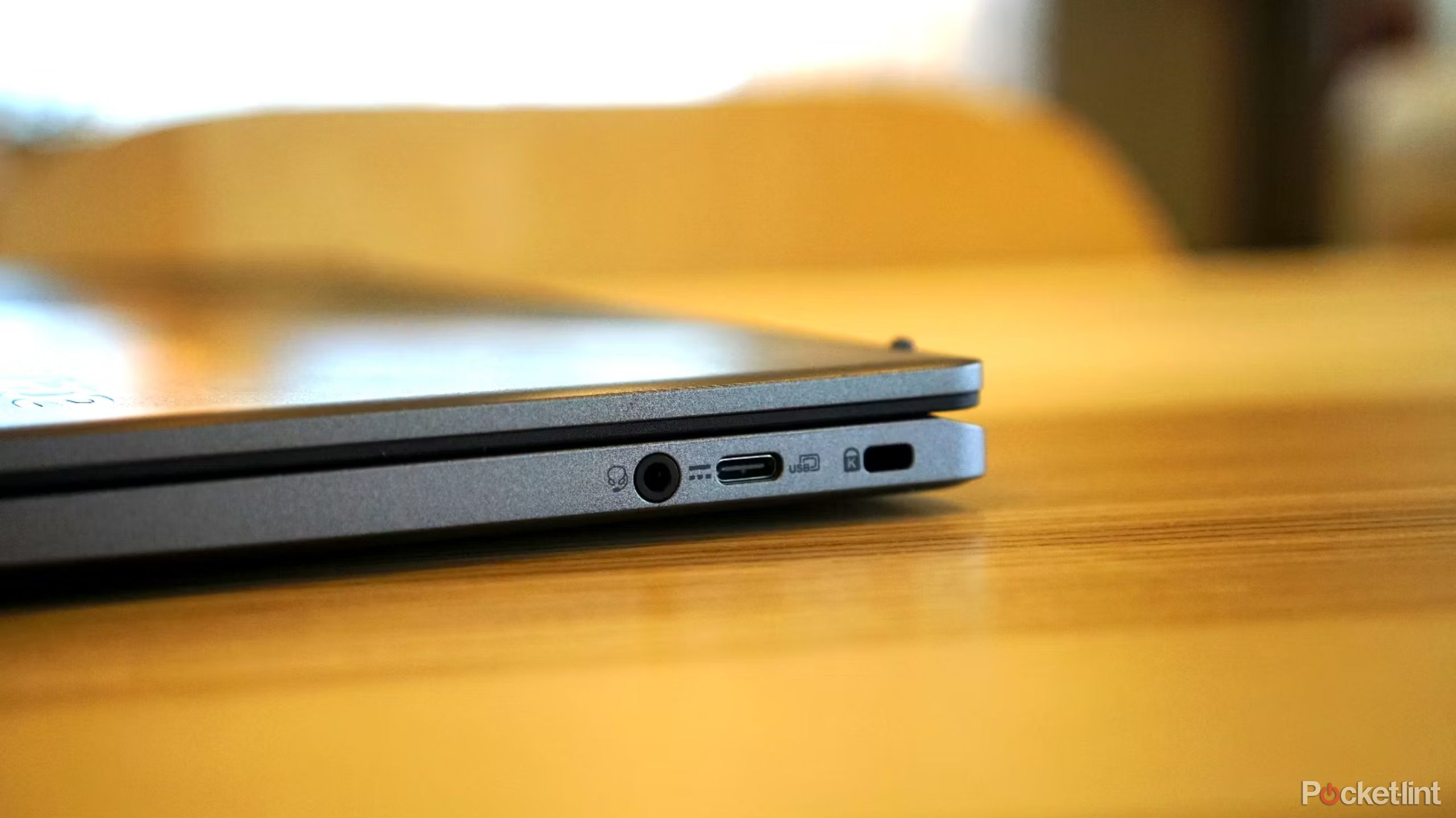 Acer Chromebook Plus charging ports on a table. 