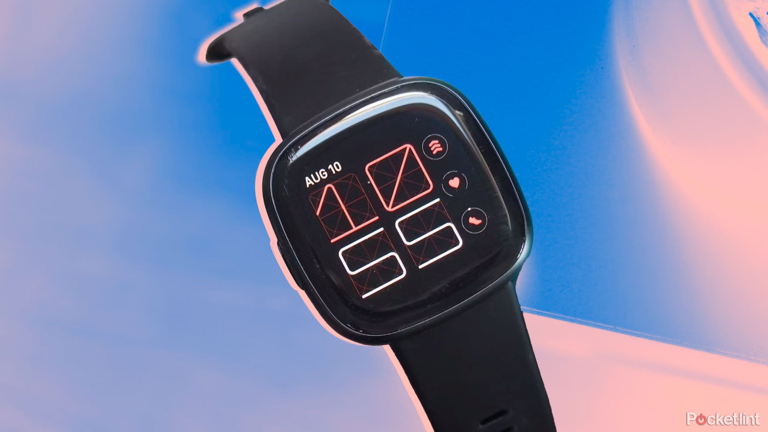 The Fitbit Versa 4 against a blue and pink background. 