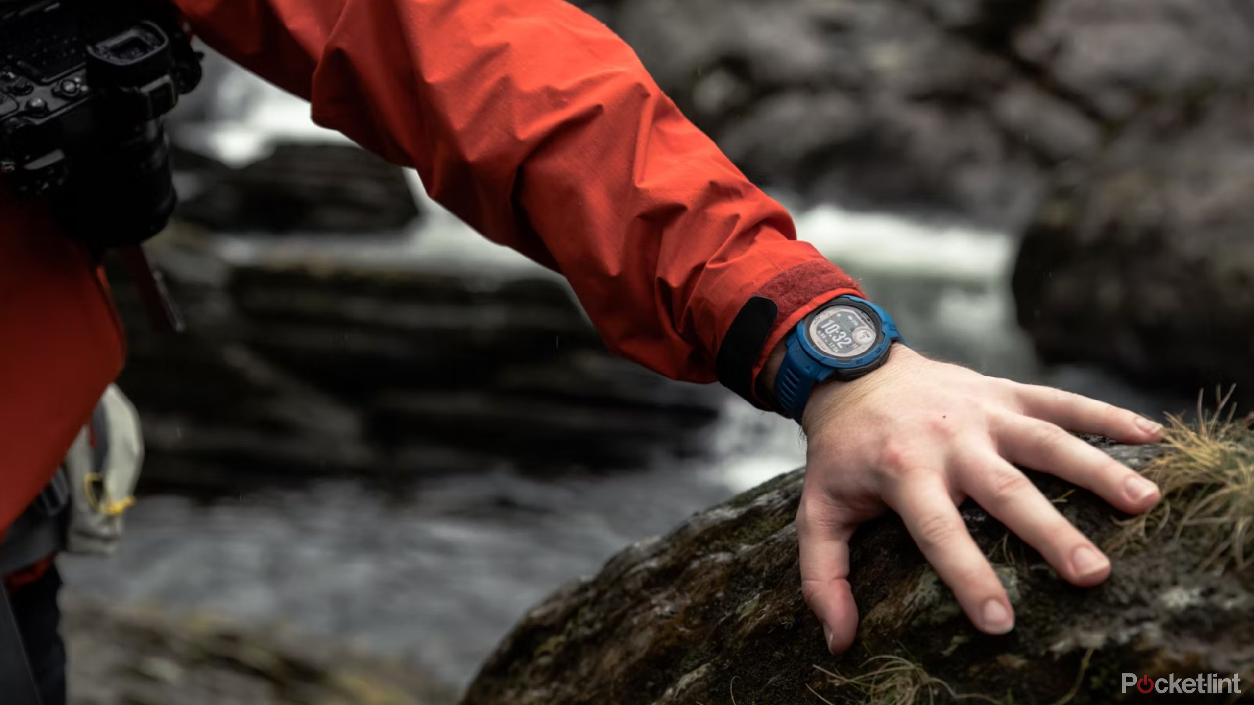 A person hiking with a Garmin Solar-12 on. 