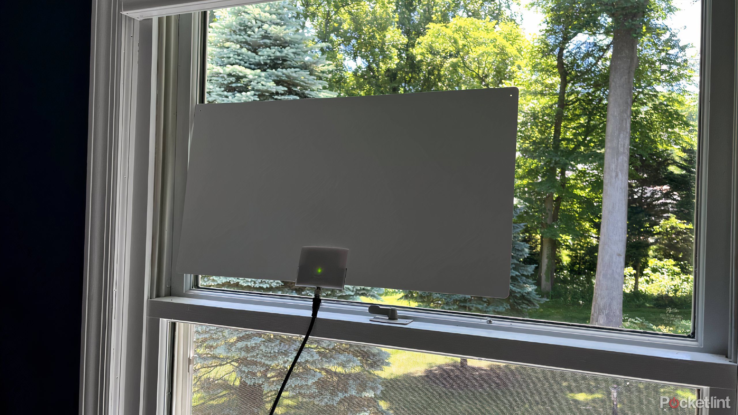 mohu leaf supreme pro digital tv antenna in a window