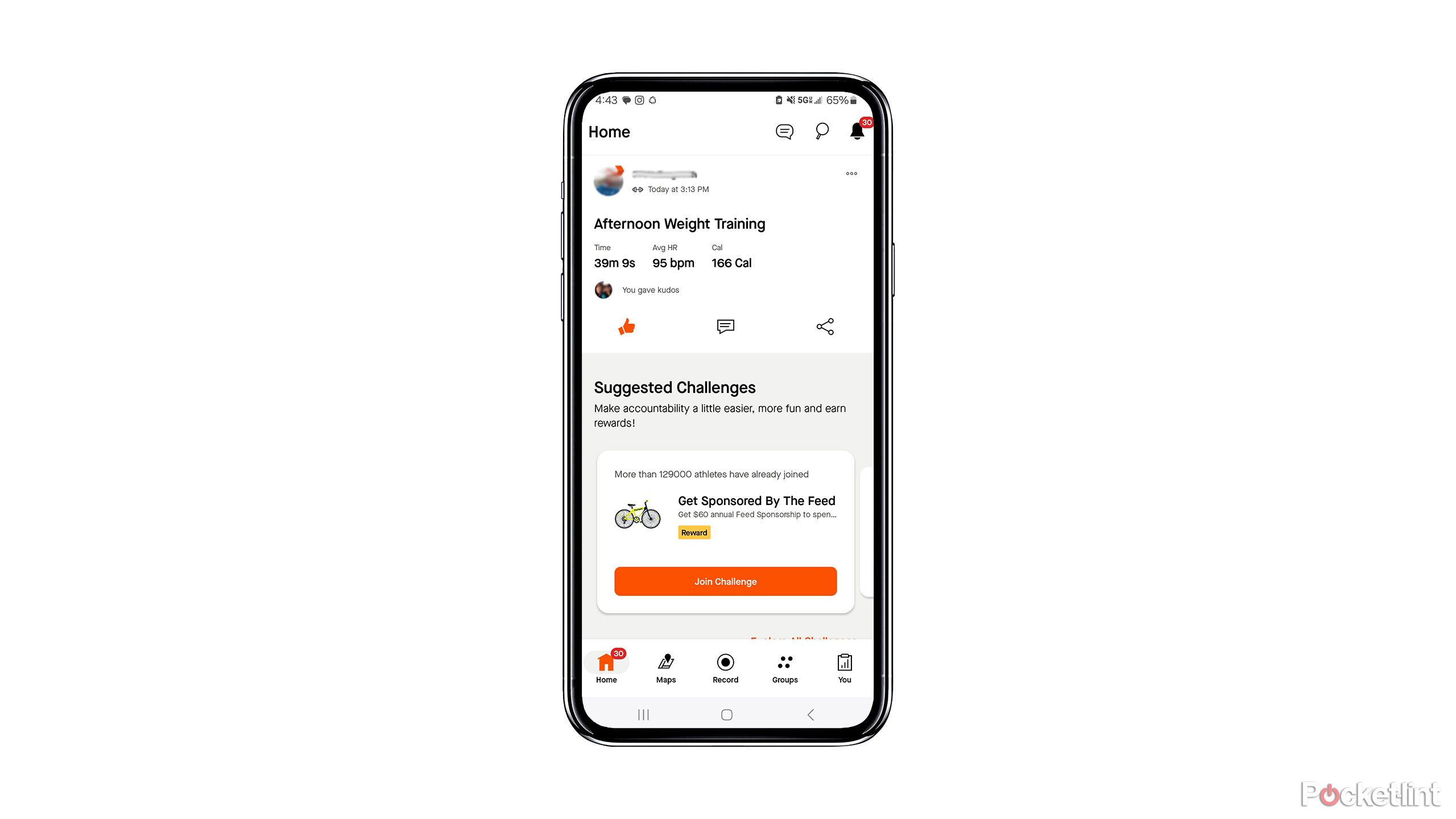 A phone with the Strava app on it against a white background. 