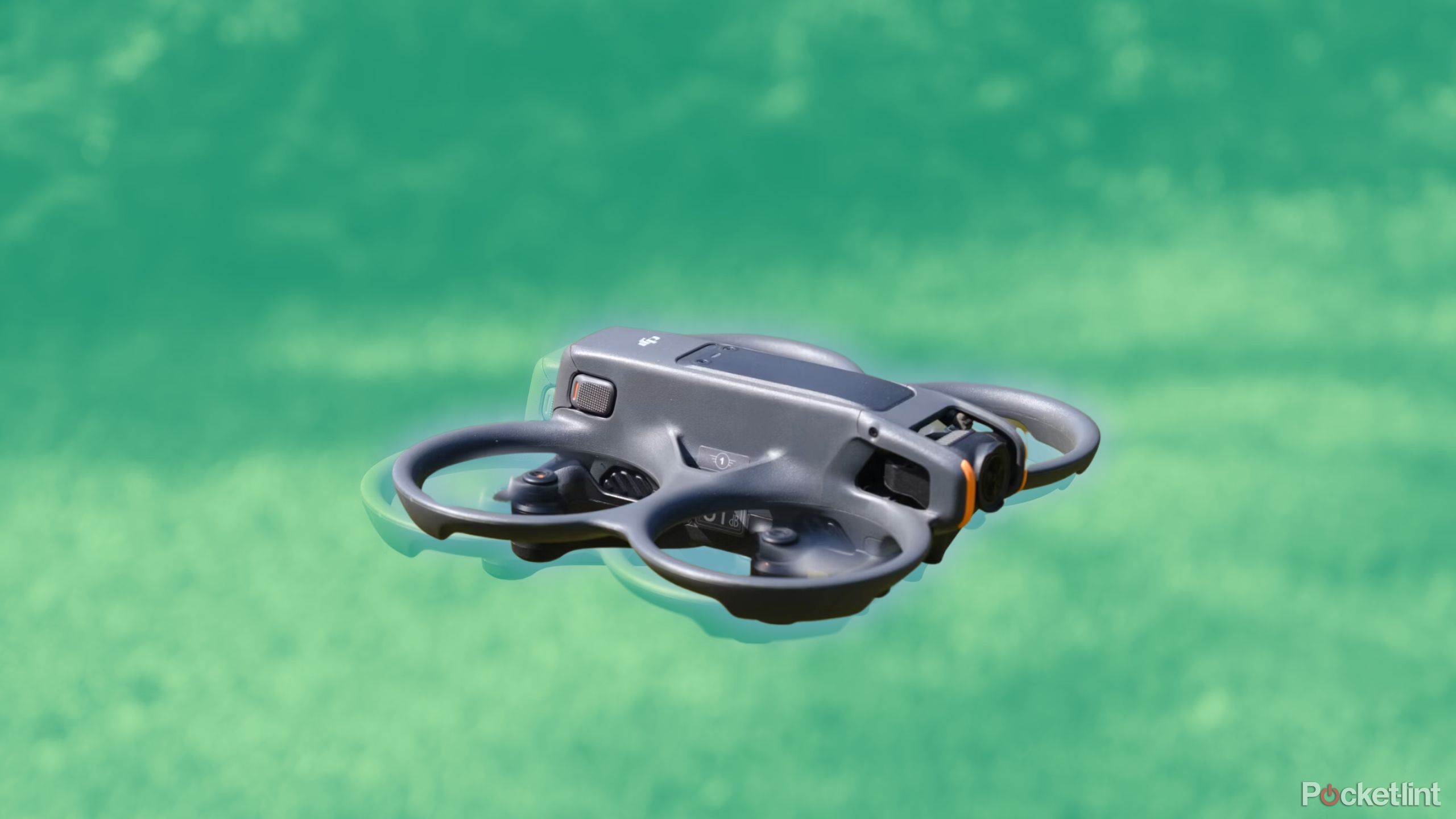 The DJI Avata 2 in flight against a green background