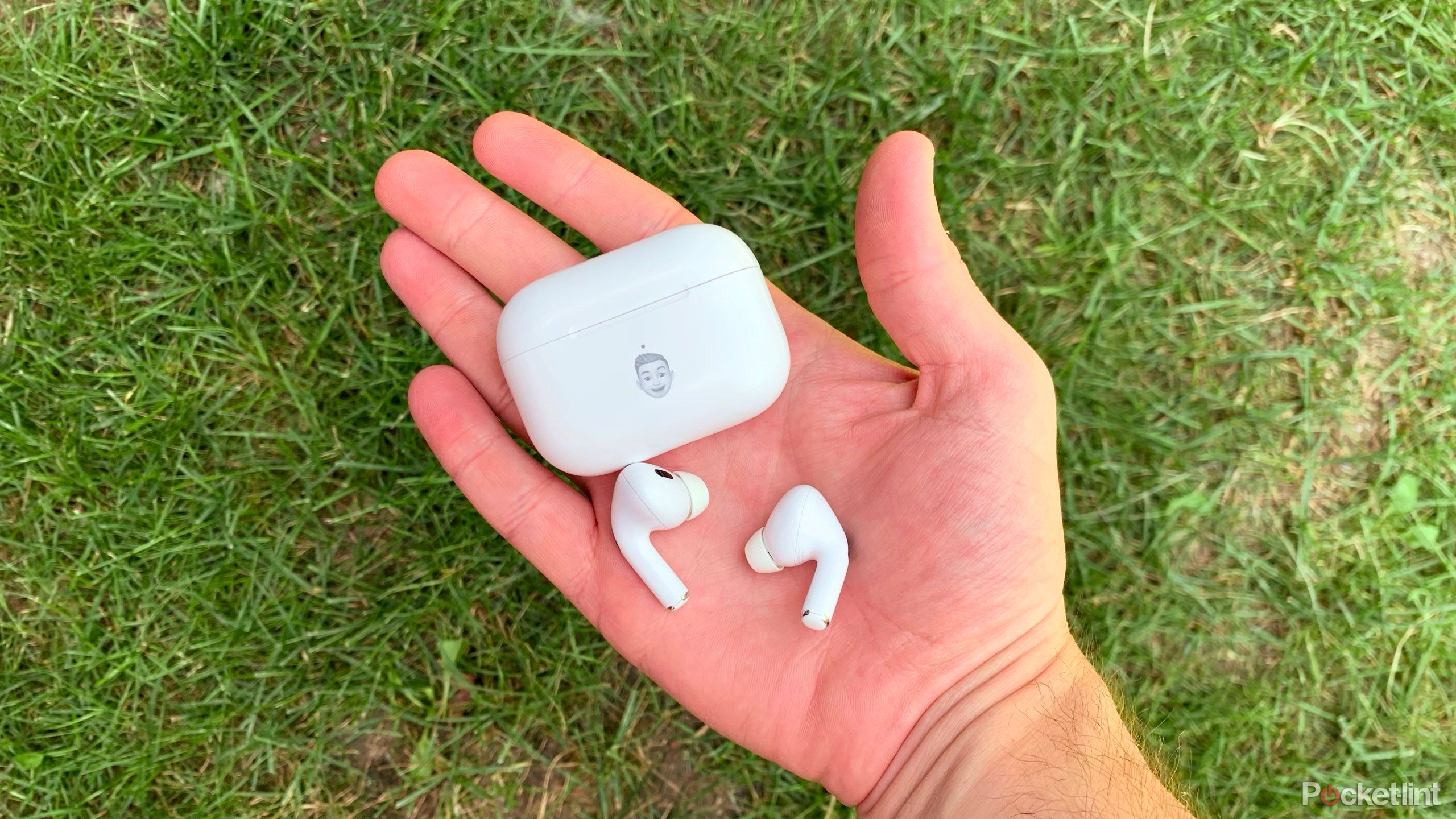 Engraved AirPods Pro in a man's hand.