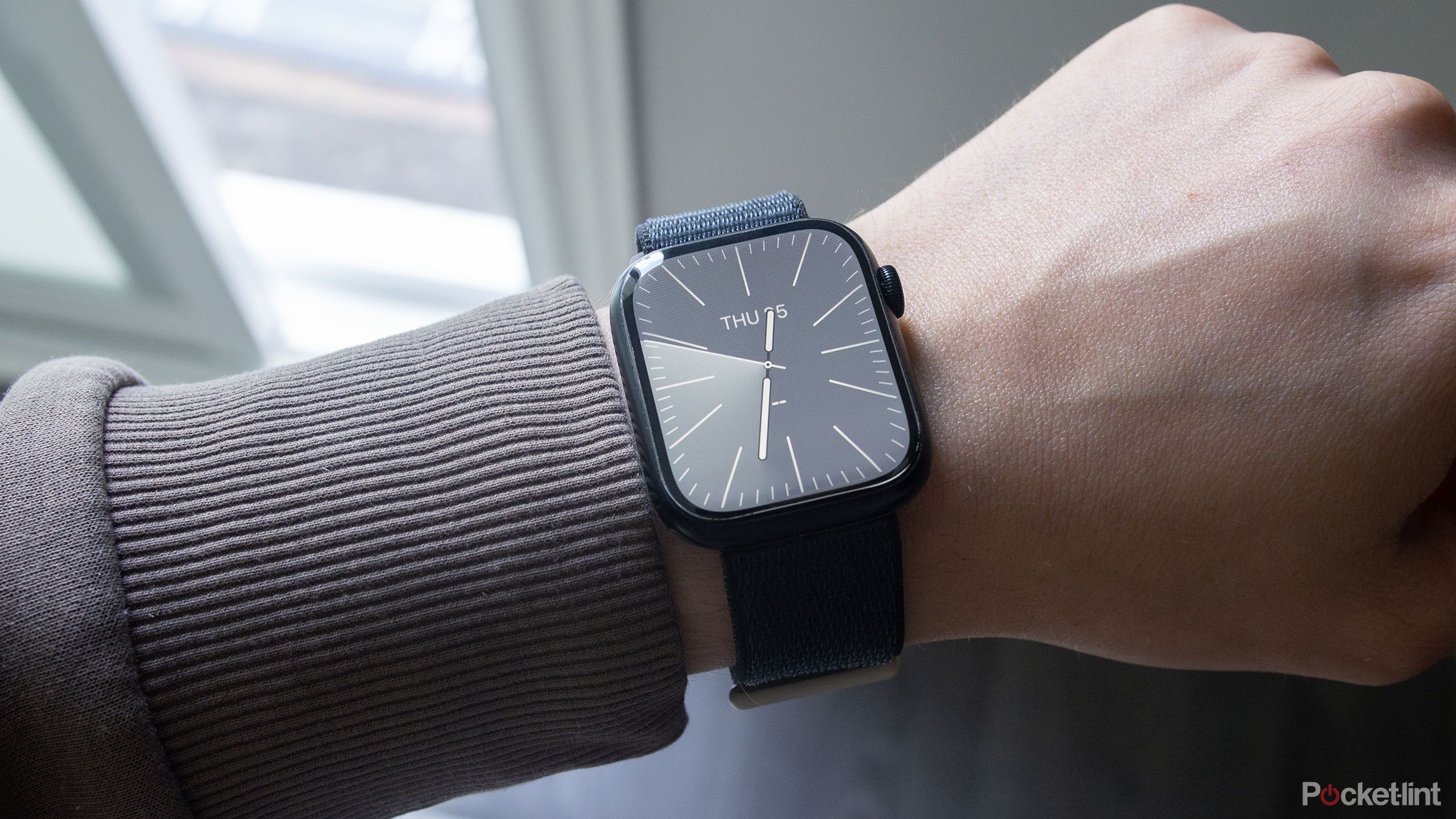 A man wears an Apple Watch on his wrist