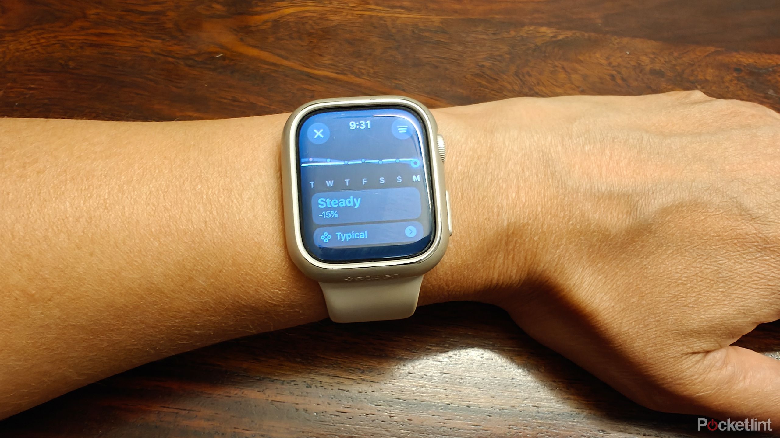 Apple Watch on an arm showing Training Load.