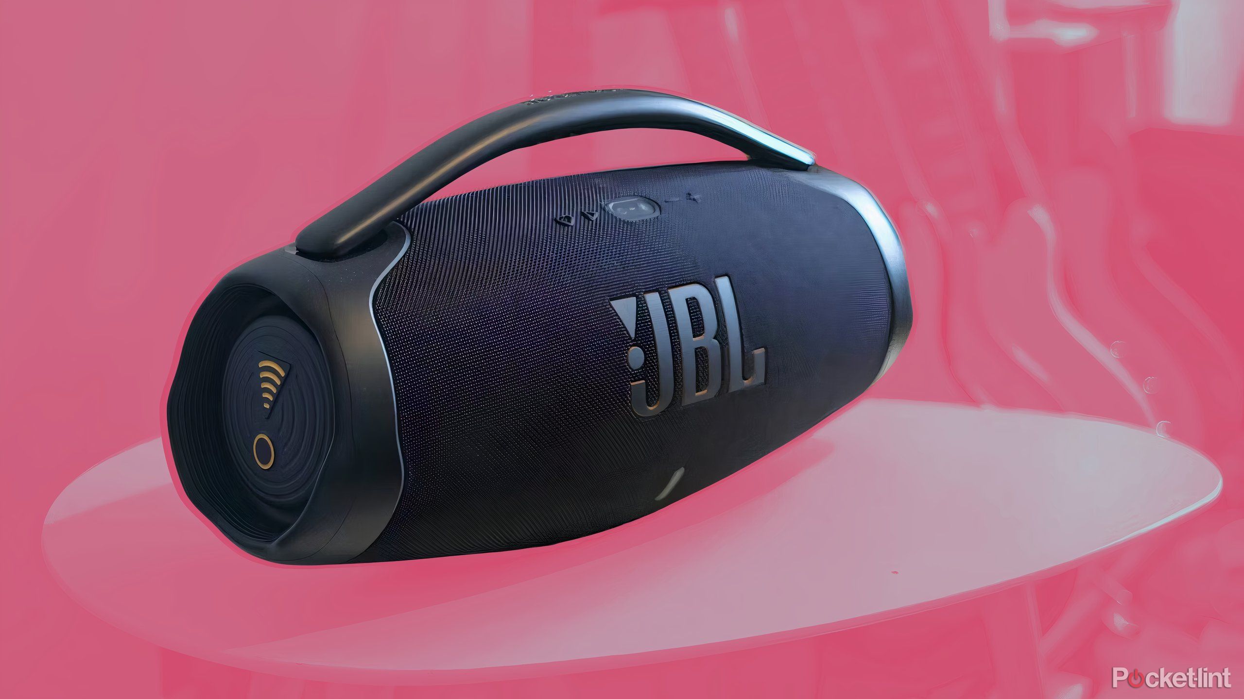 The JBL Boombox 3 Wi-Fi on a colorful, pink background.