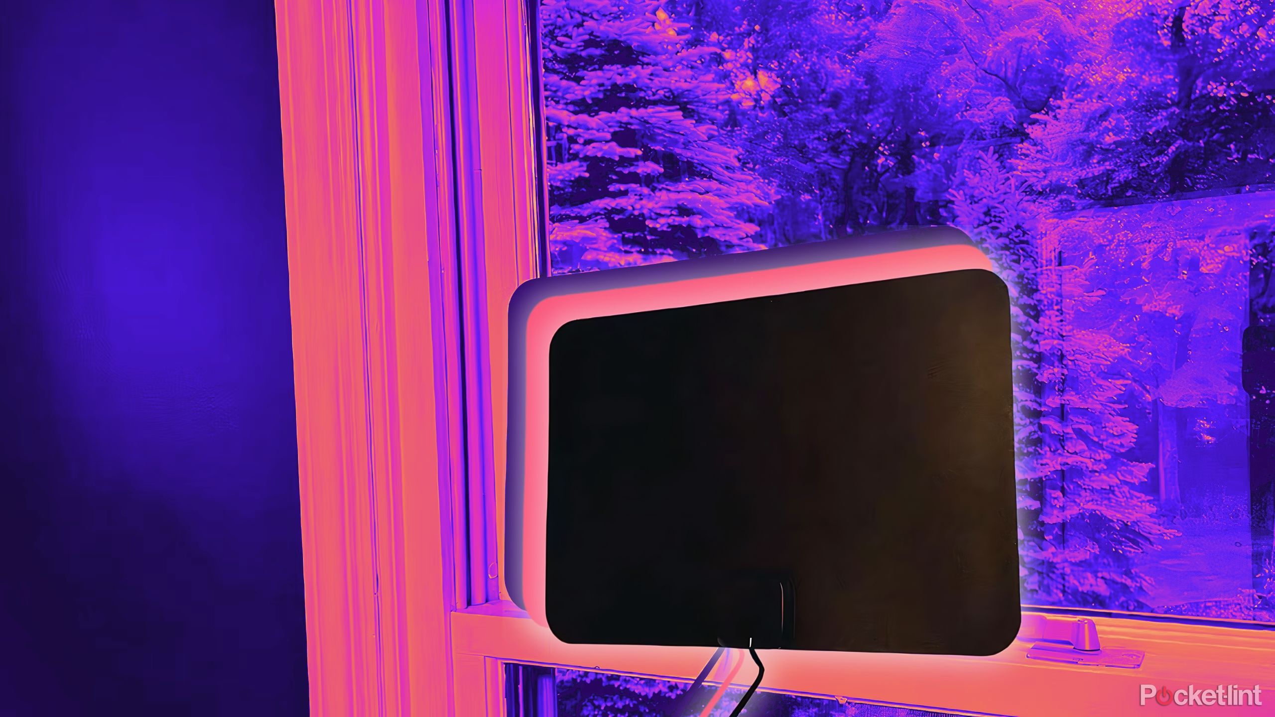 gesobyte digital TV antenna on a window in a purple and pink background.