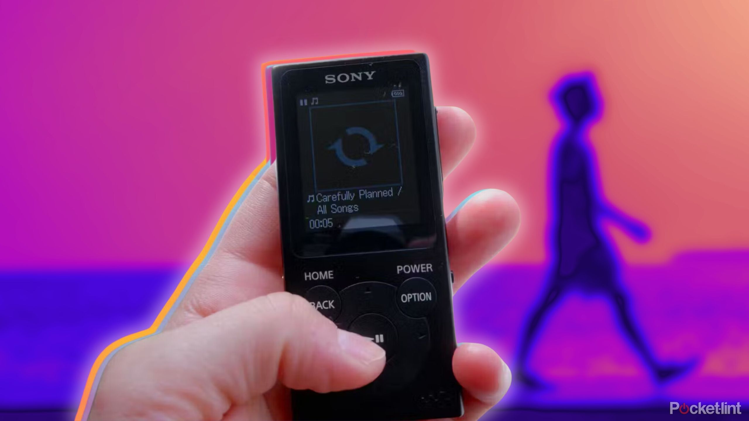 Someone holding a Sony Walkman with a silhouette of a person walking behind. 