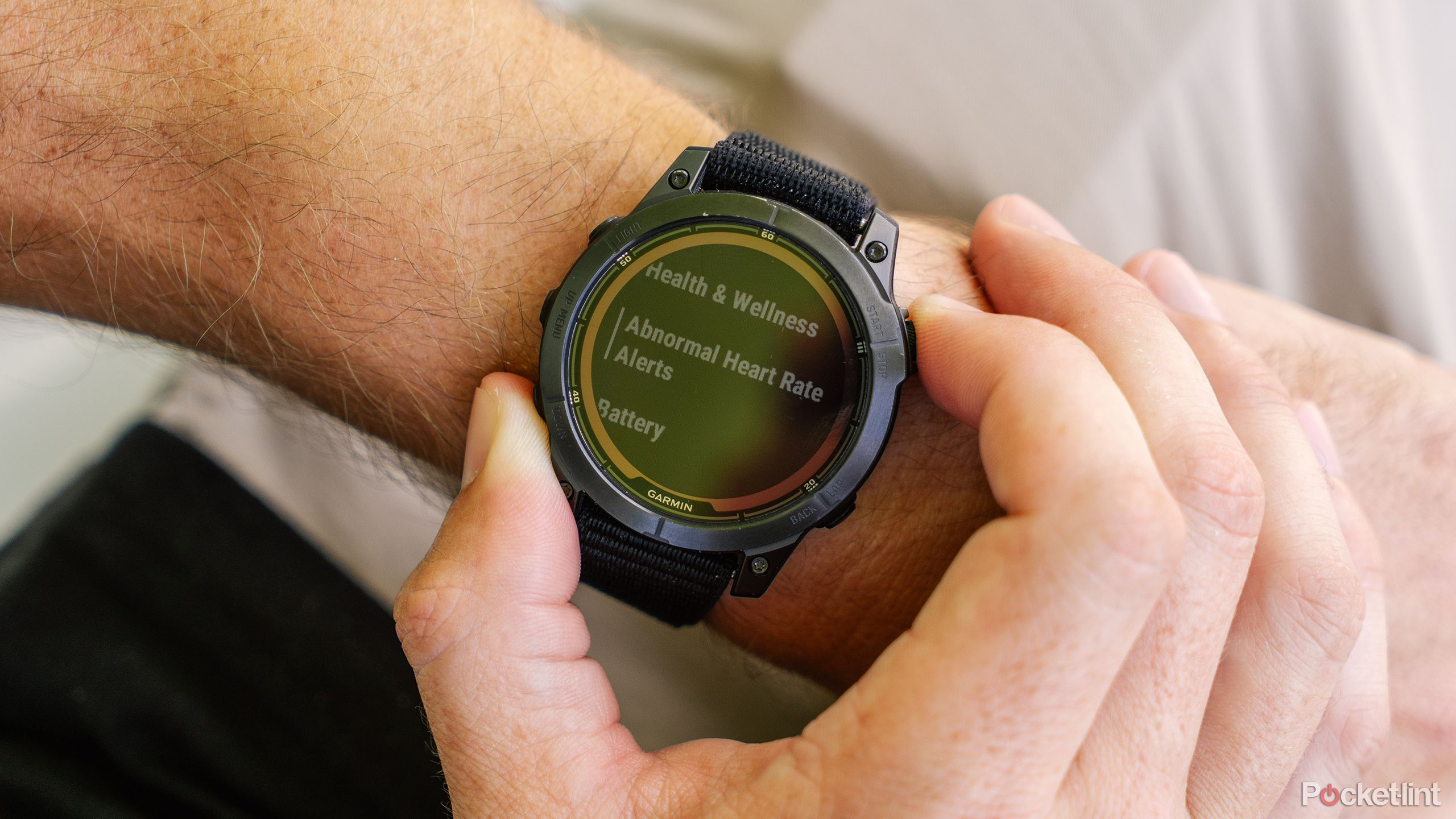 A Garmin Fenix 7 Pro Solar on a wrist. 