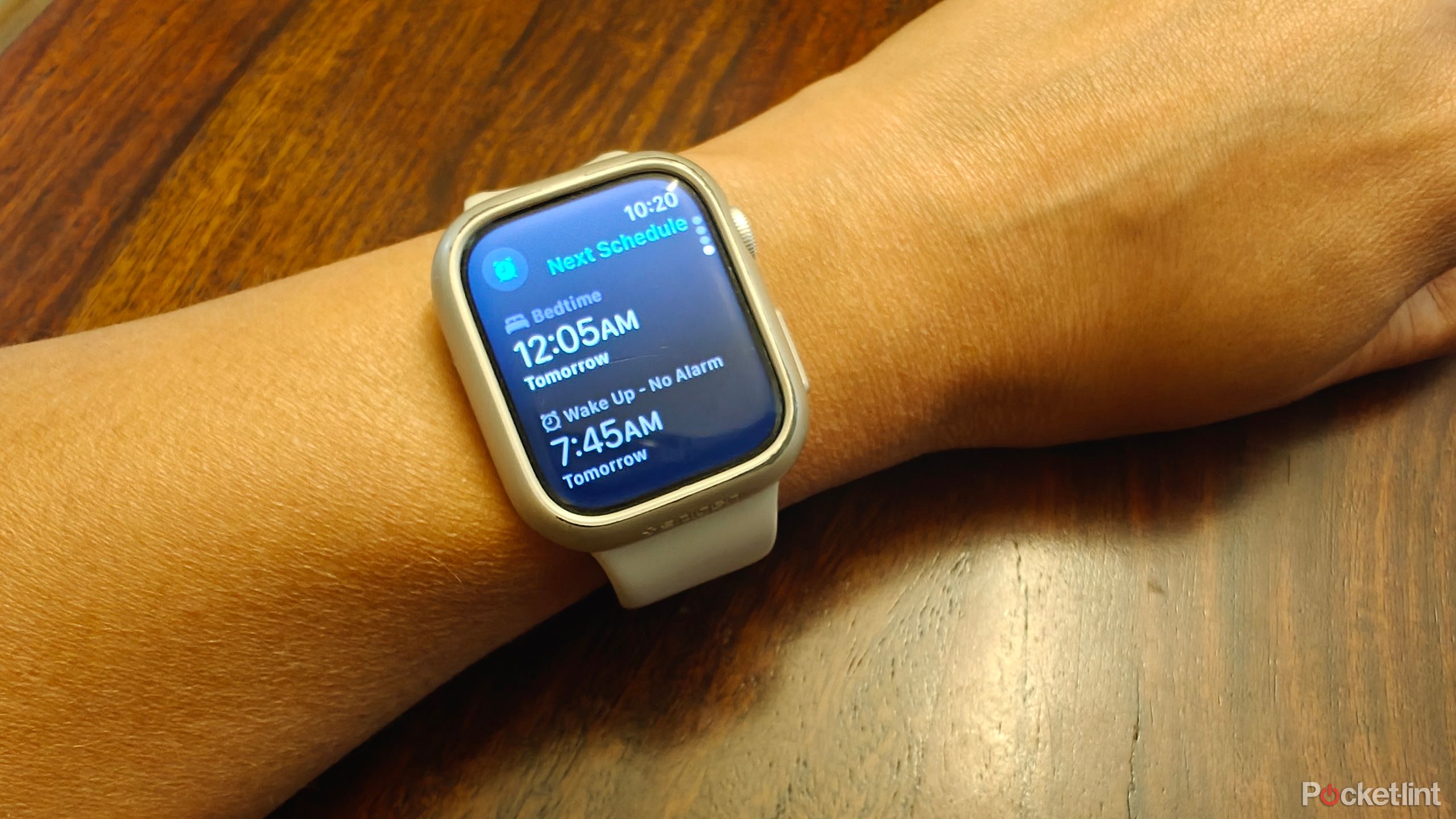 An Apple Watch showing a sleep schedule with a bedtime and wake-up time.