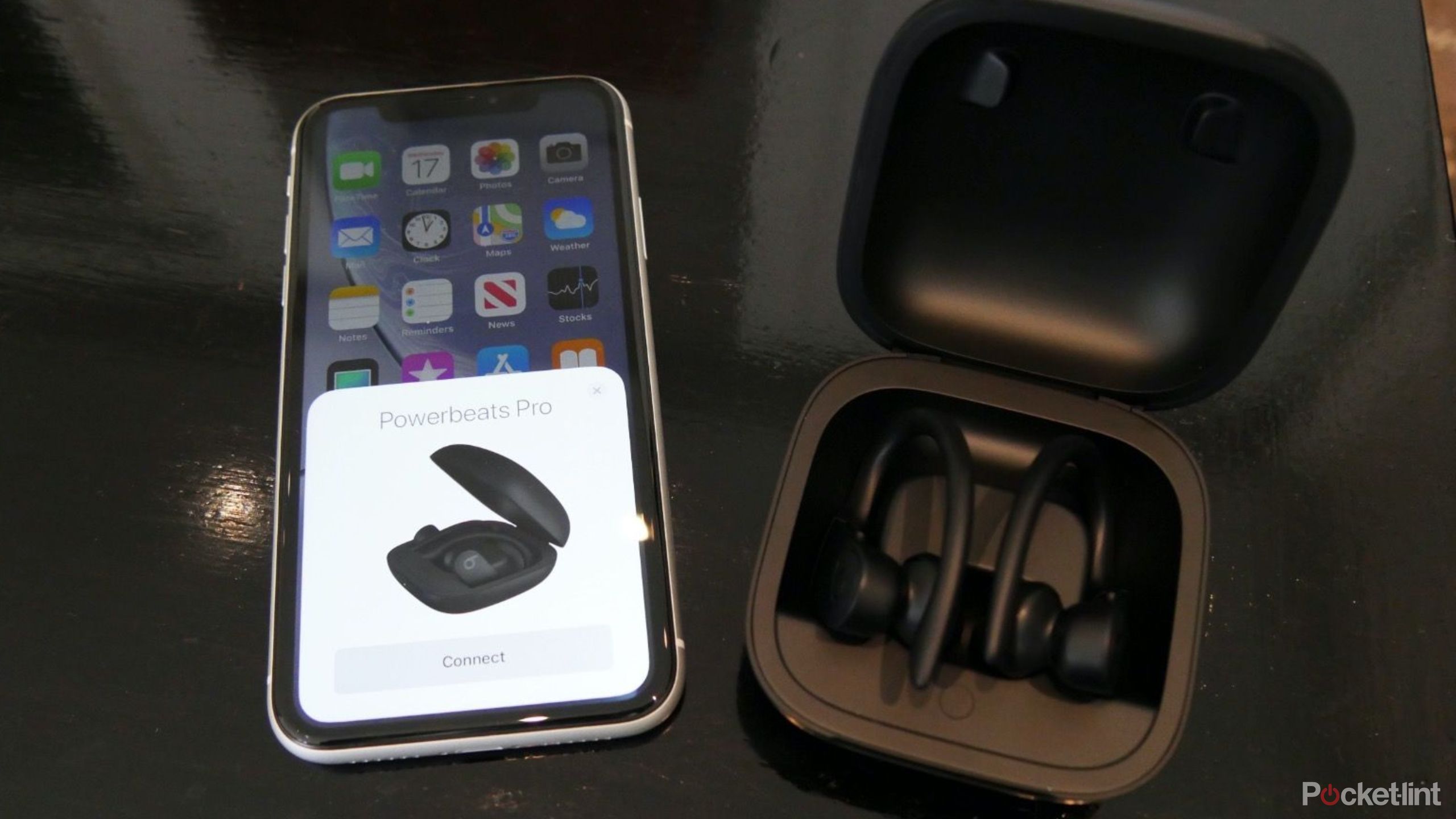 Beats Powerbeats Pro next to an iPhone