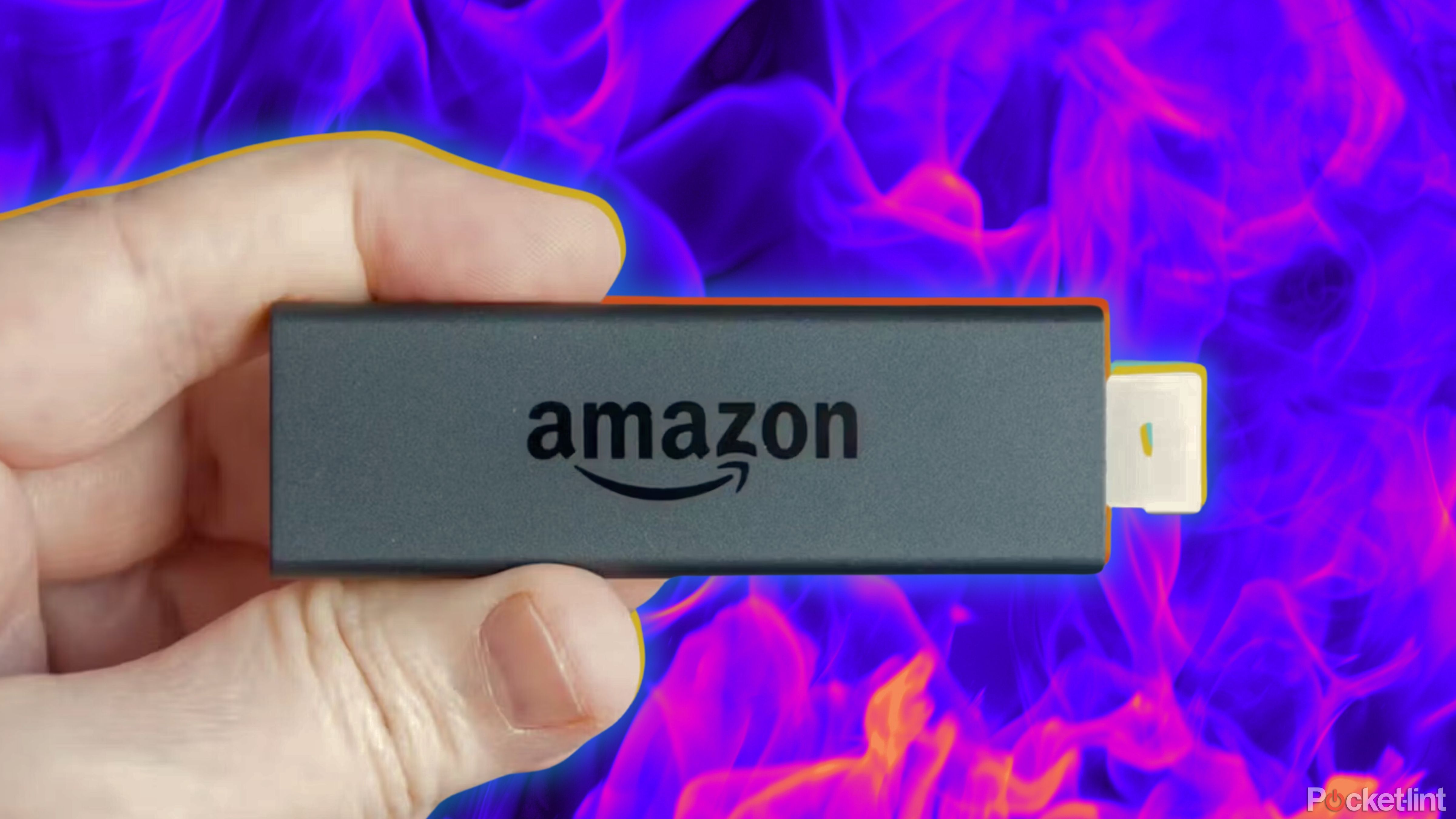 Amazon Fire TV Stick against purple flames