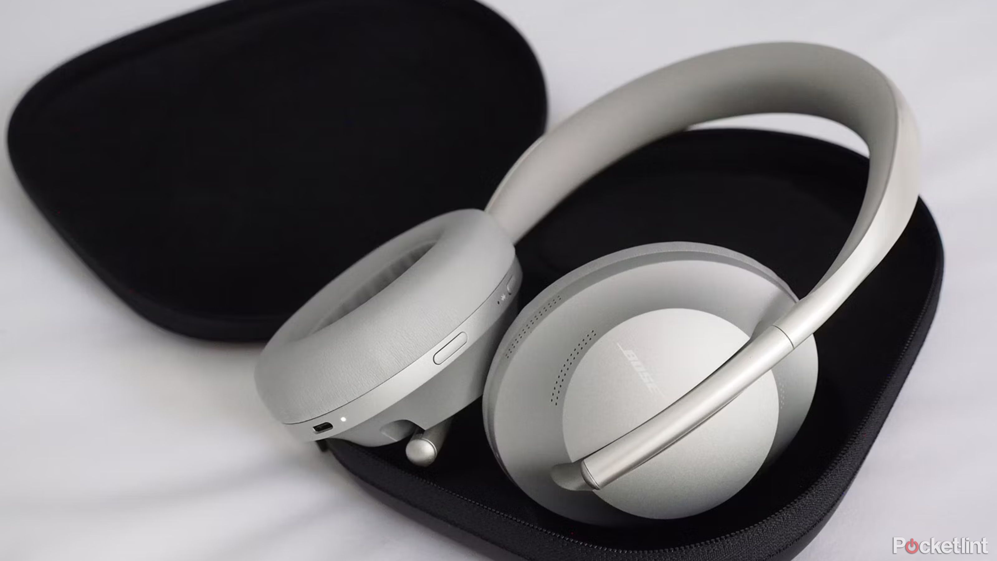 Bose Smart Noise Cancelling Headphones 700 in their case from the side. 