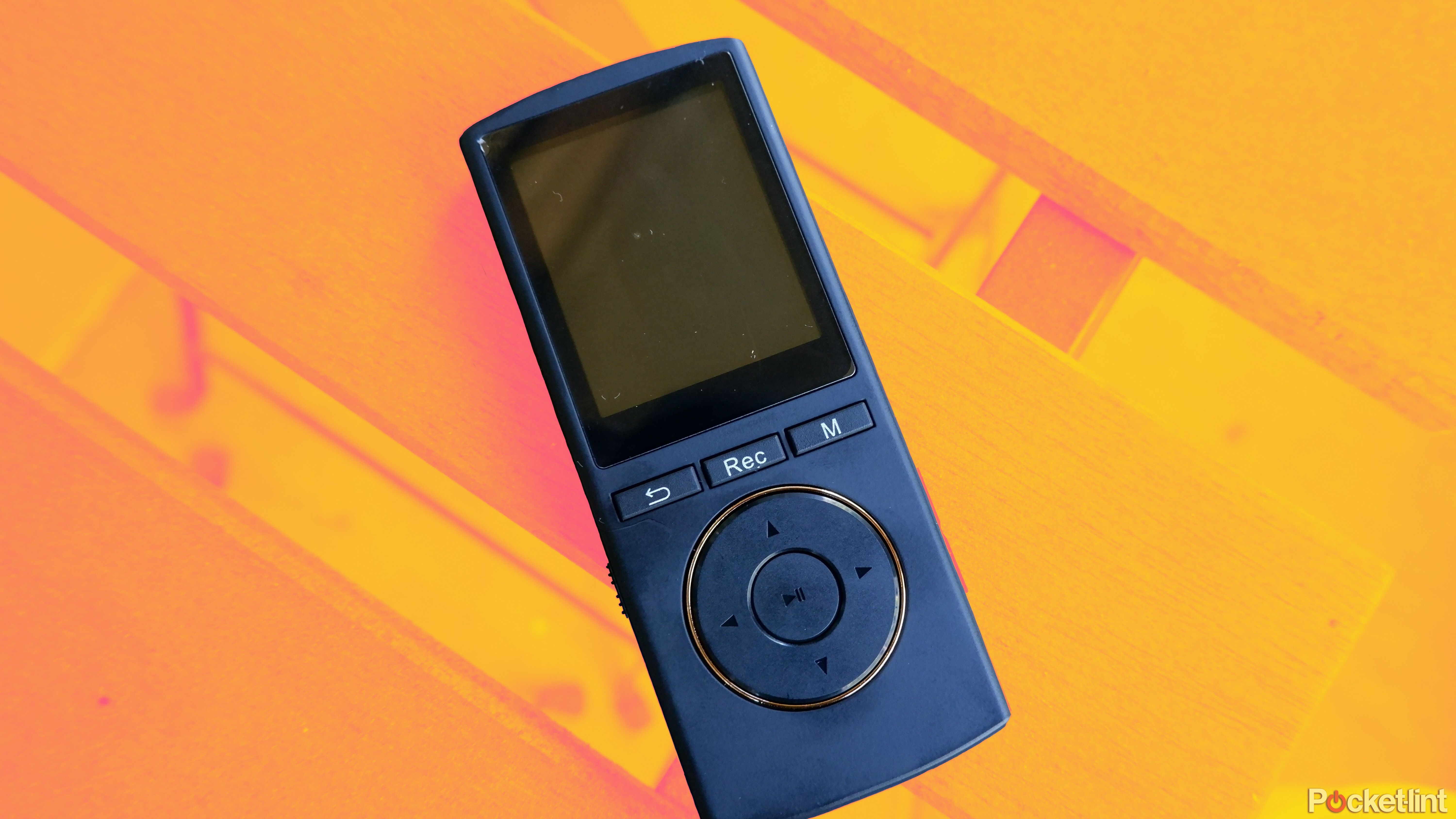 An MP3 player outside on a patio table