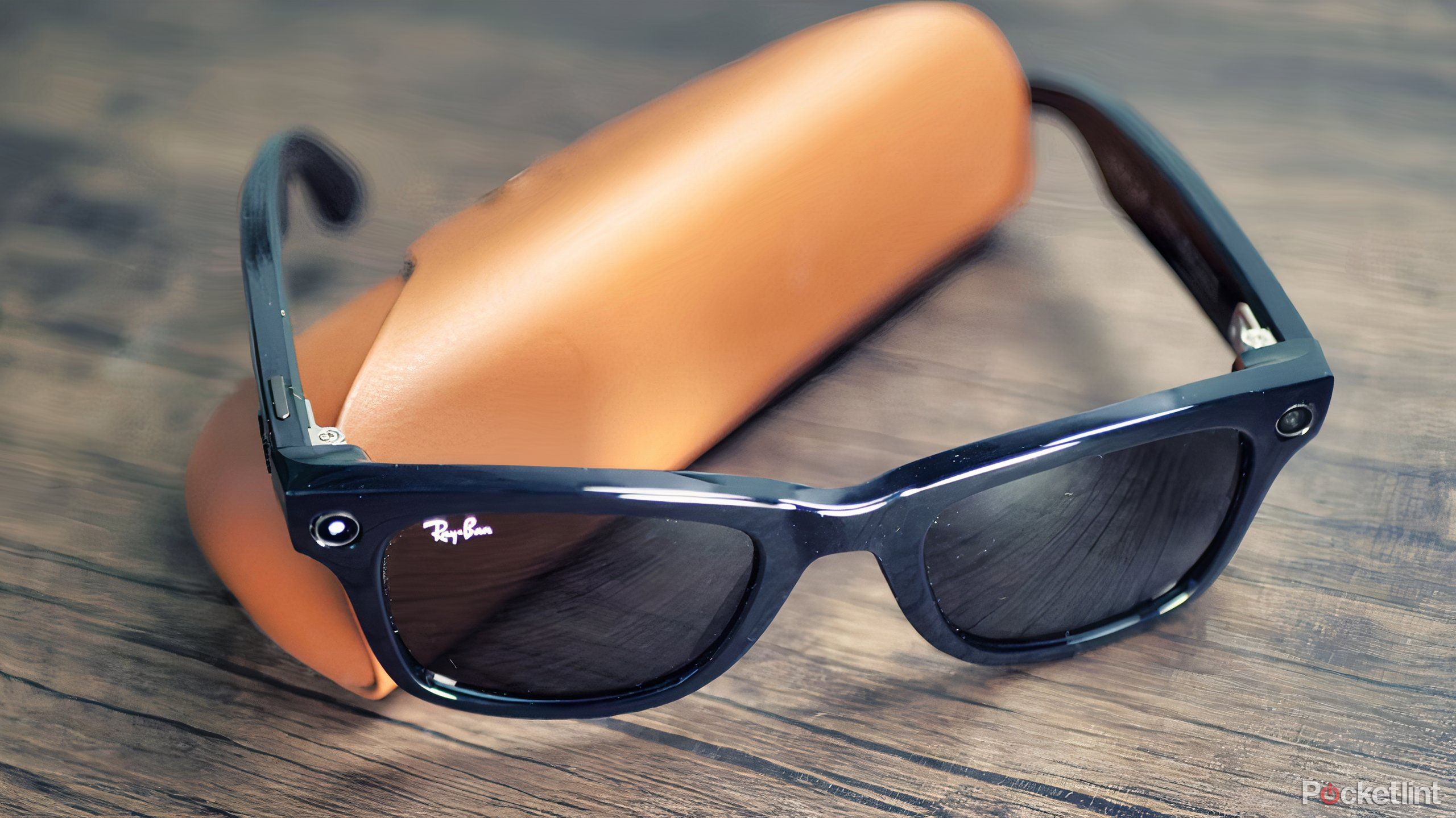 Ray-Ban Meta Smart Glasses laying on their case.