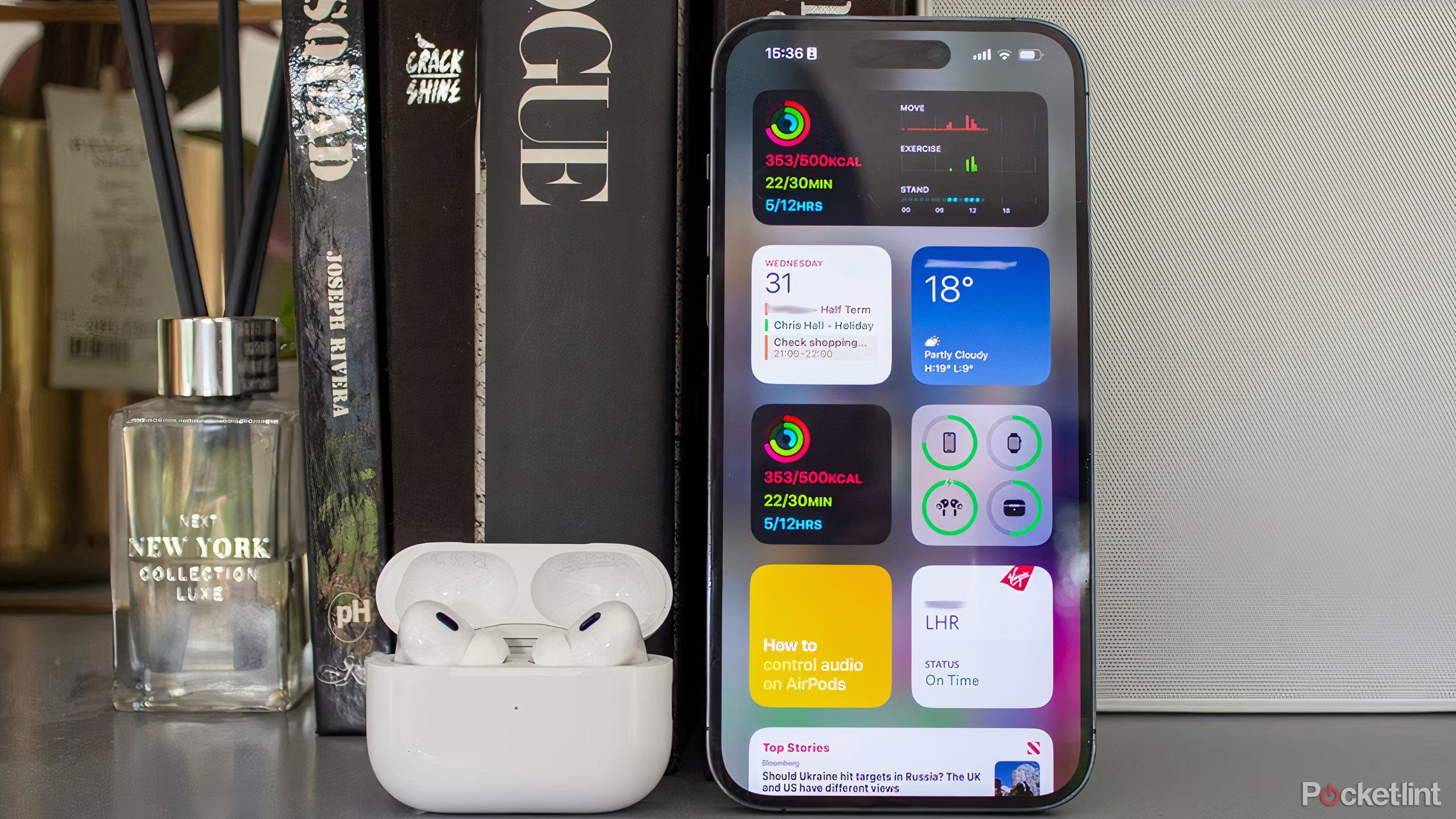 AirPods next to an iPhone