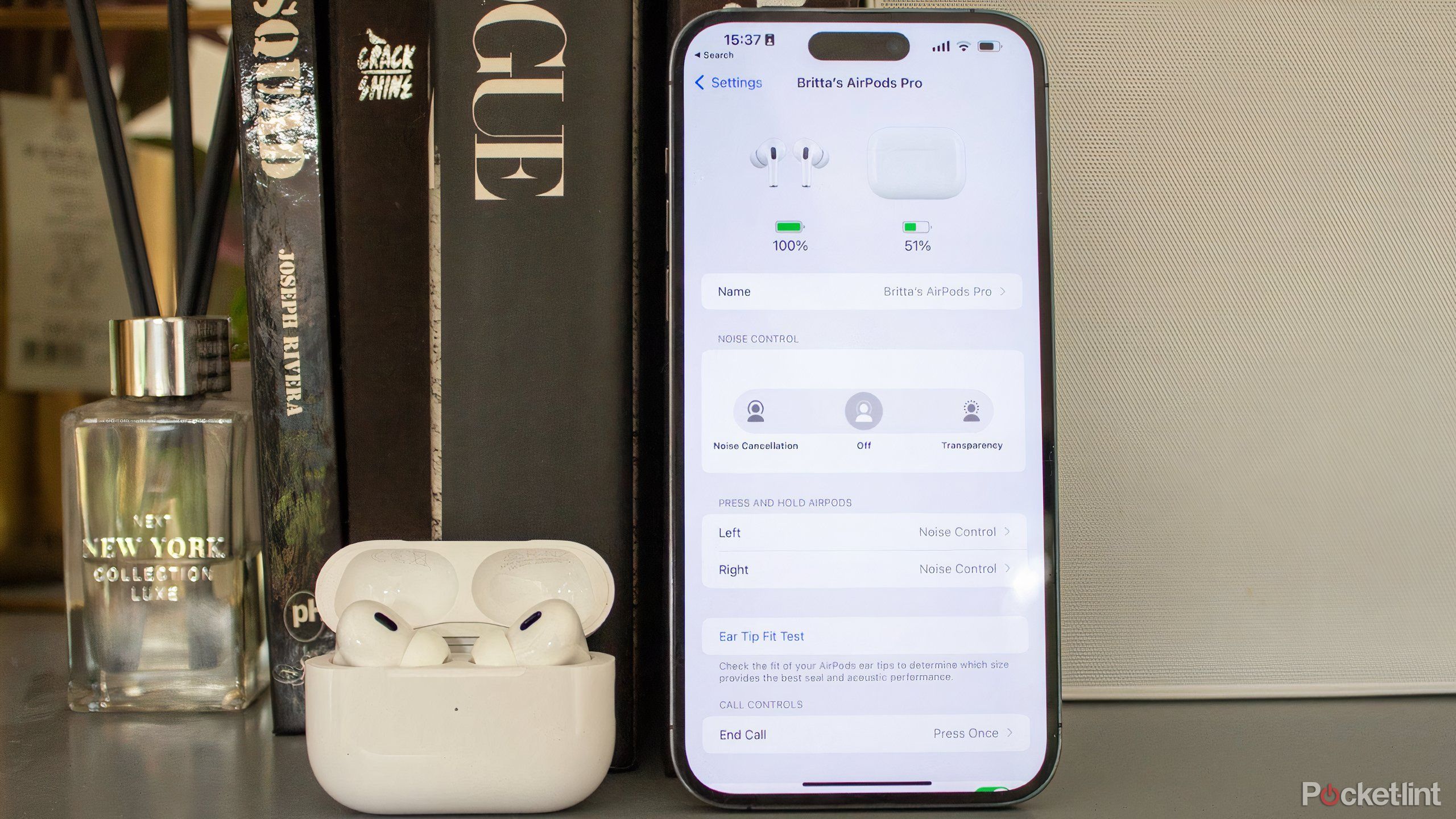 AirPods next to an iPhone