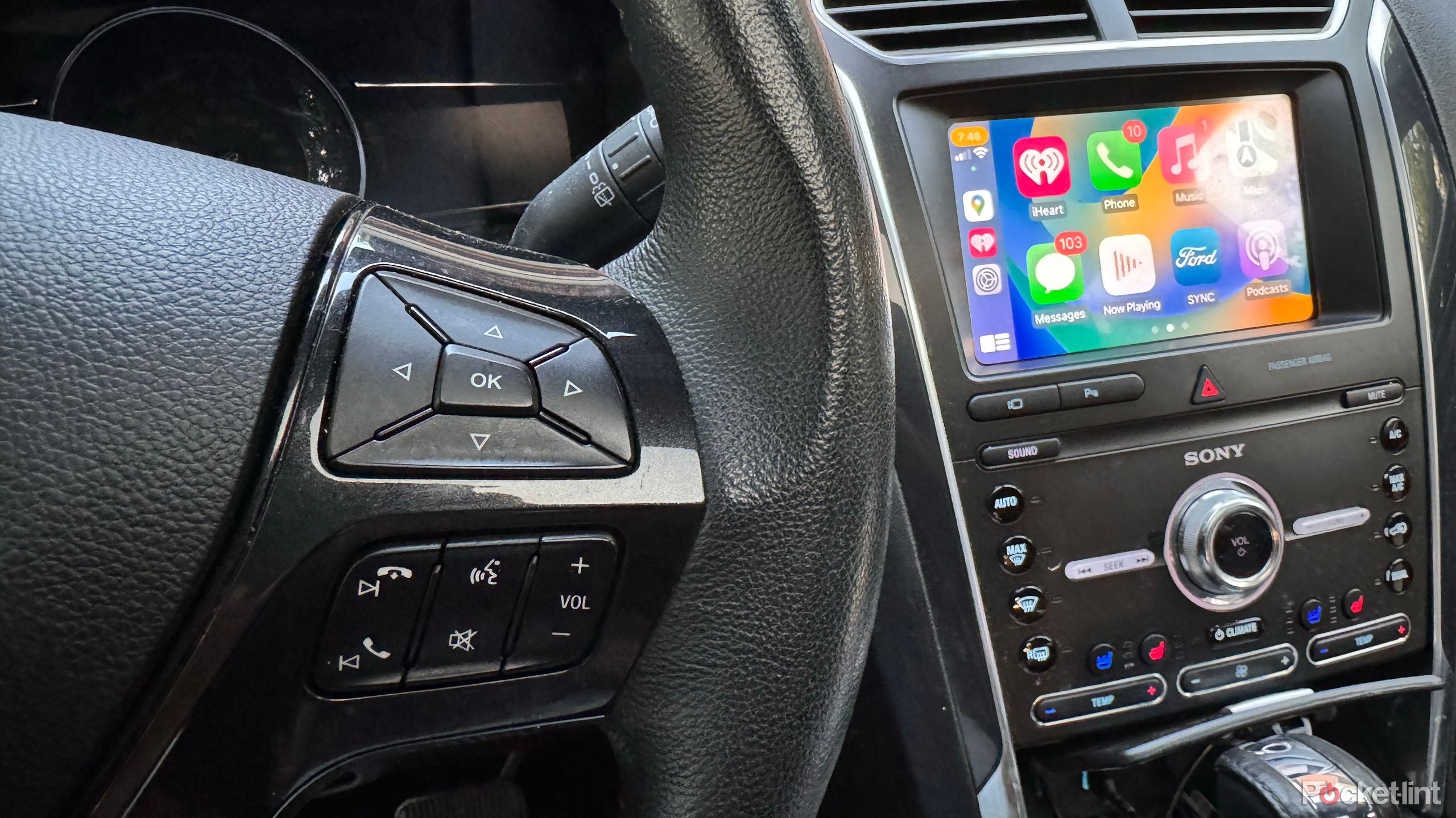 The buttons on a steering wheel can be used to control Siri in CarPlay. 