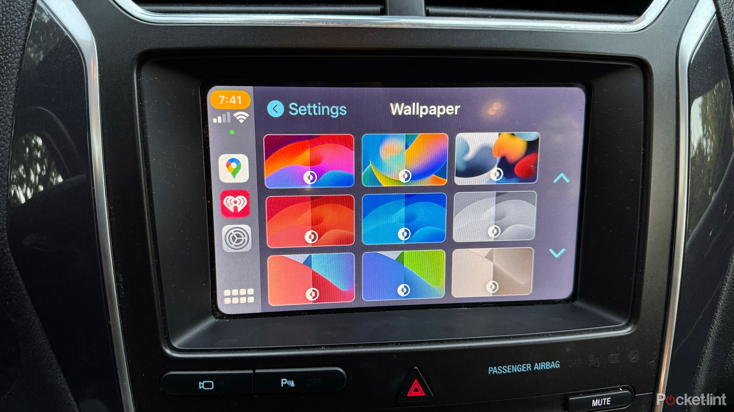 Changing wallpaper settings on Apple CarPlay. 