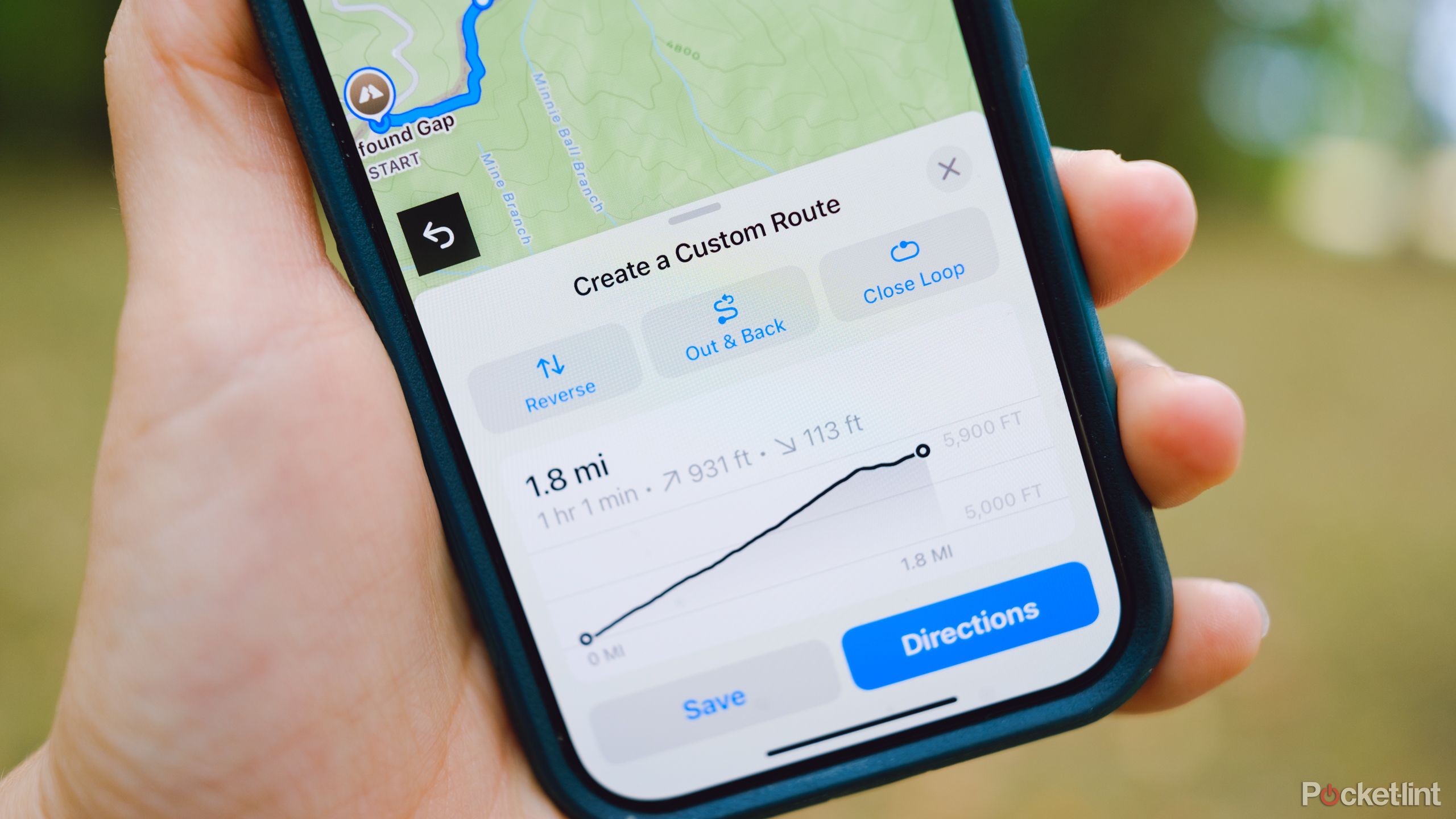 A photography of the Apple Maps custom walking routes feature displayed on an iPhone close up