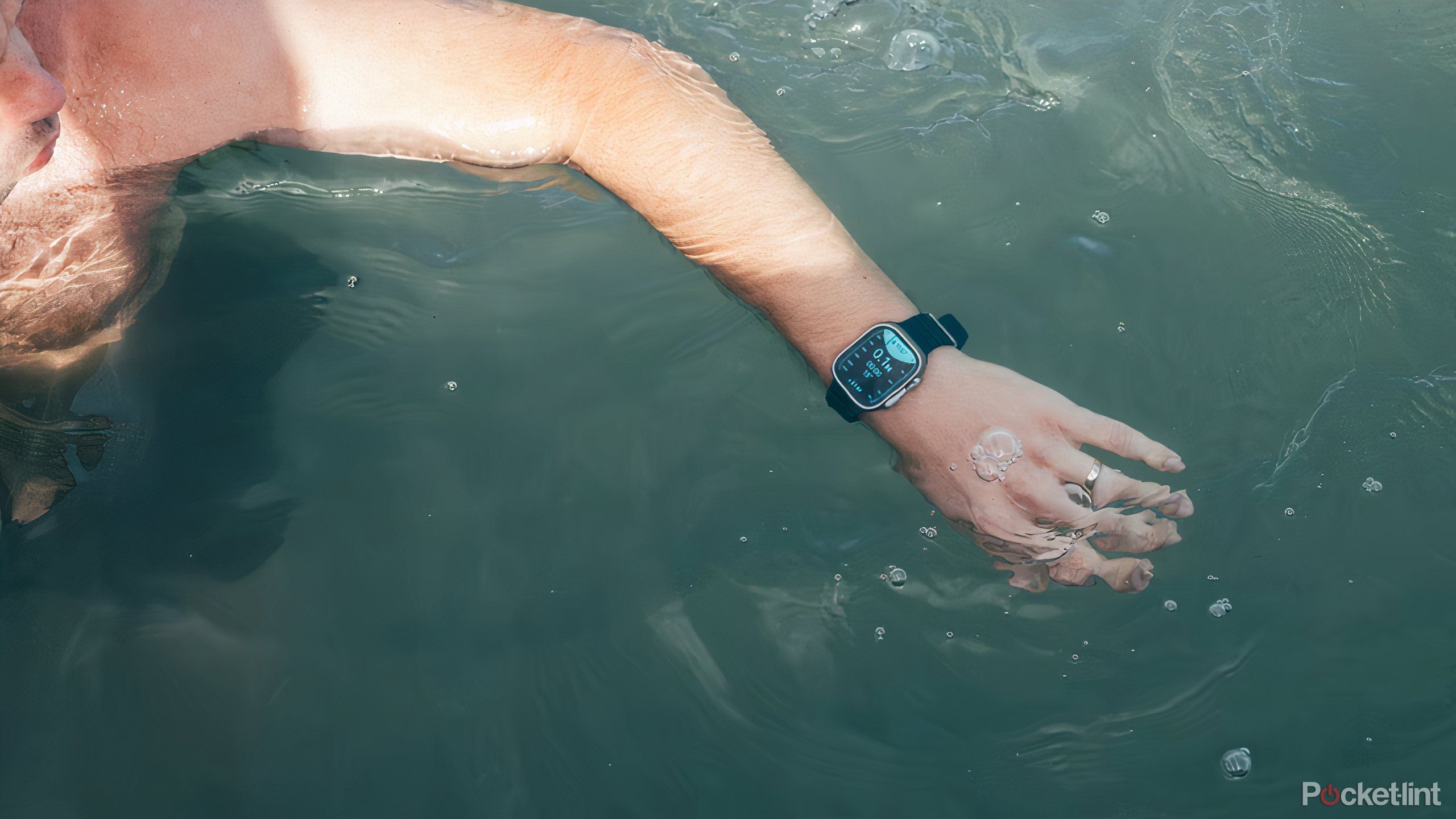 Wearing the Apple Watch Ultra 2 in the water.