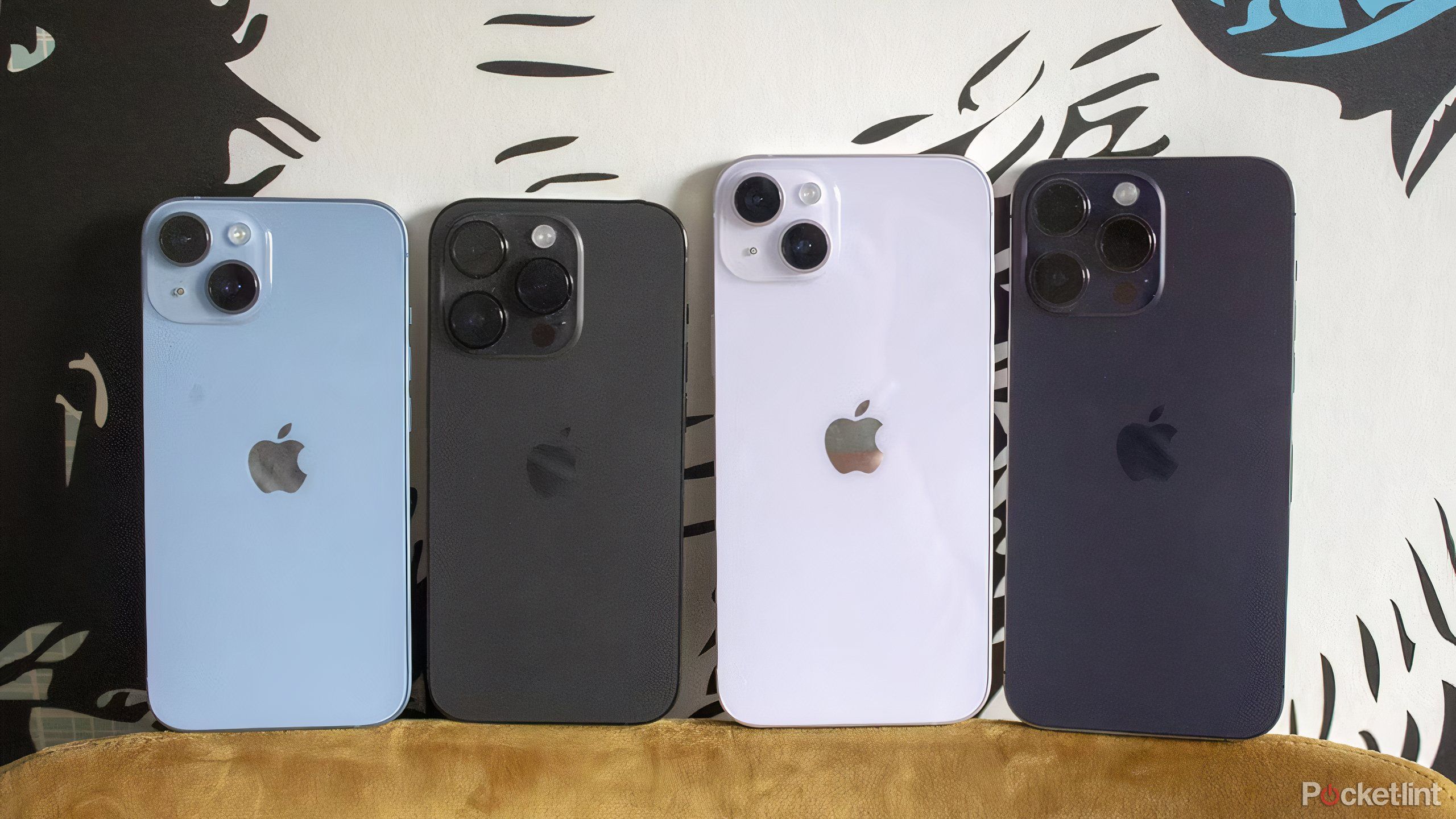 iPhone 14 lineup next to one another