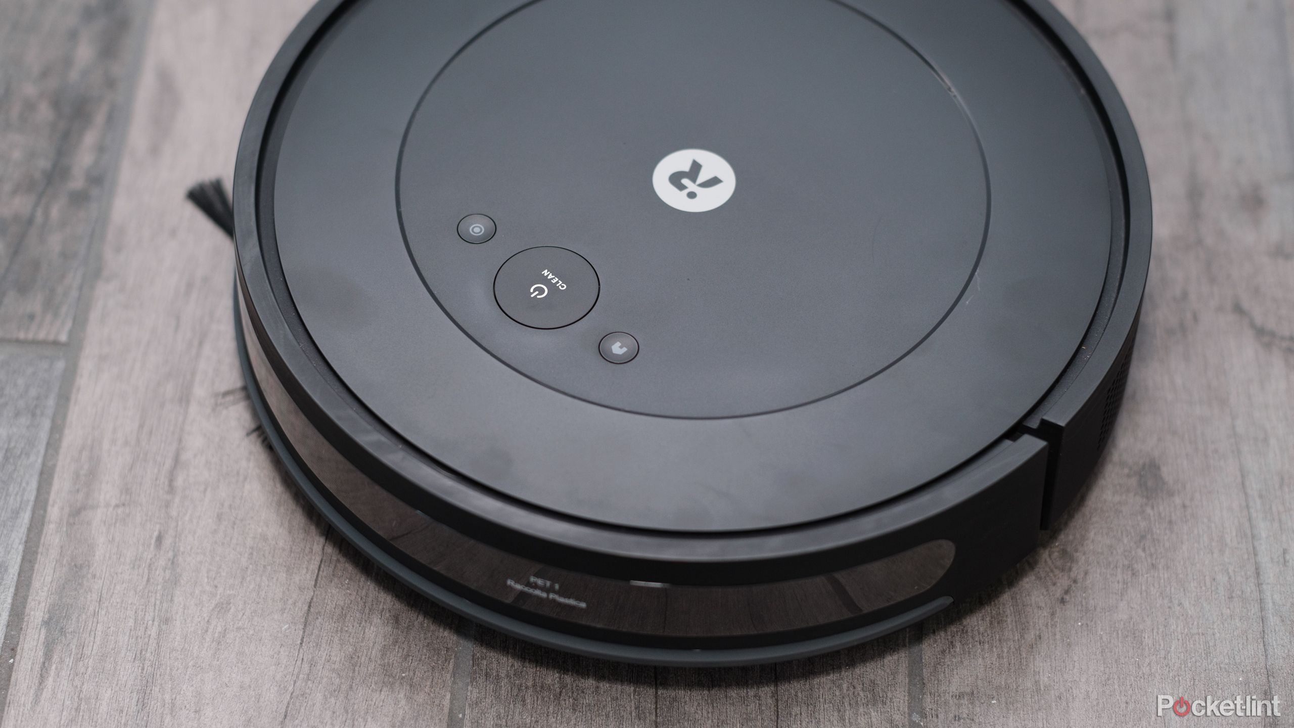 A photograph of the iRobot Roomba Combo Essential on hard floors