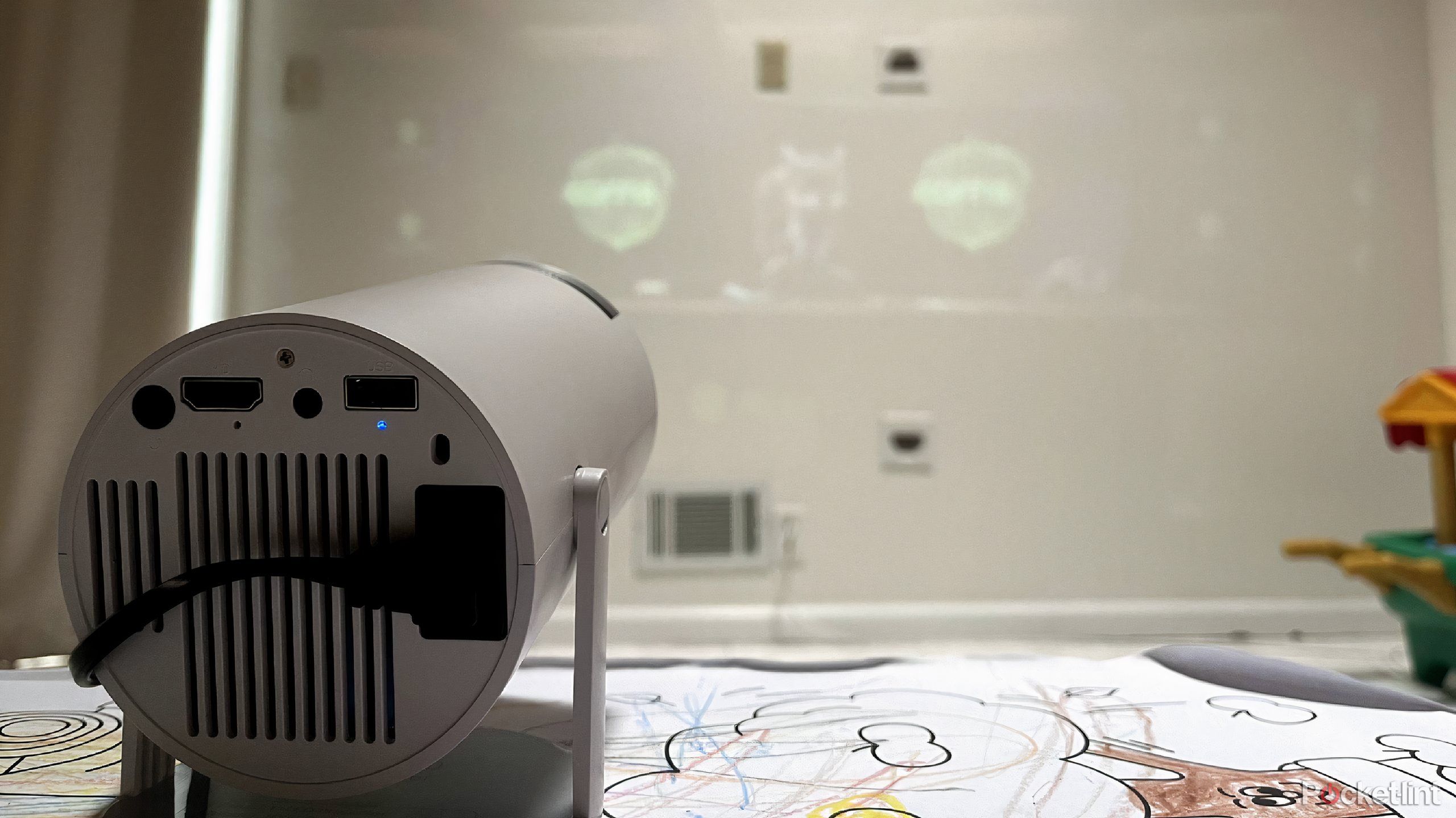 magcubic auto keystone projector on a wall