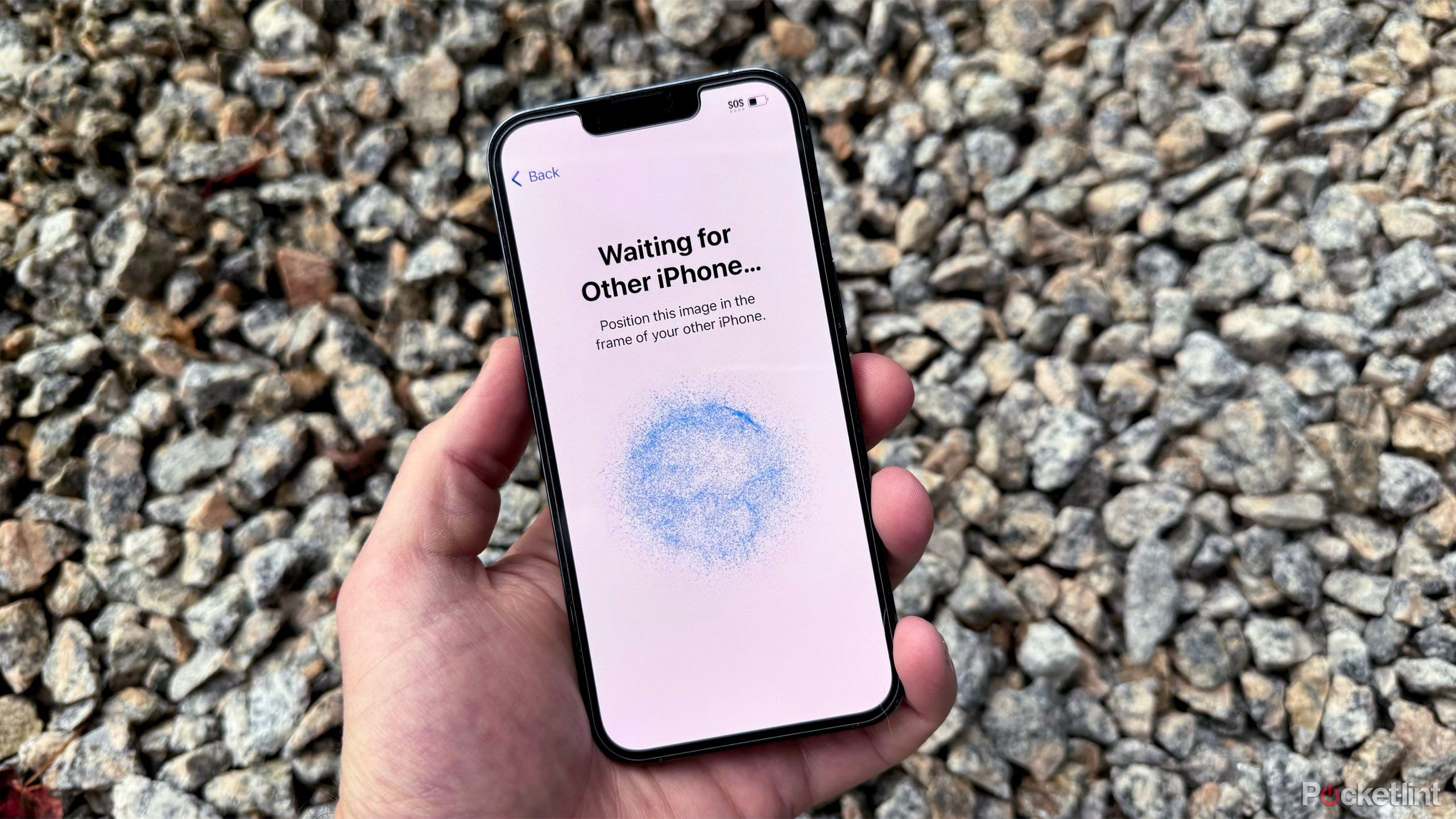 iPhone Setup Screen in front of rocks 