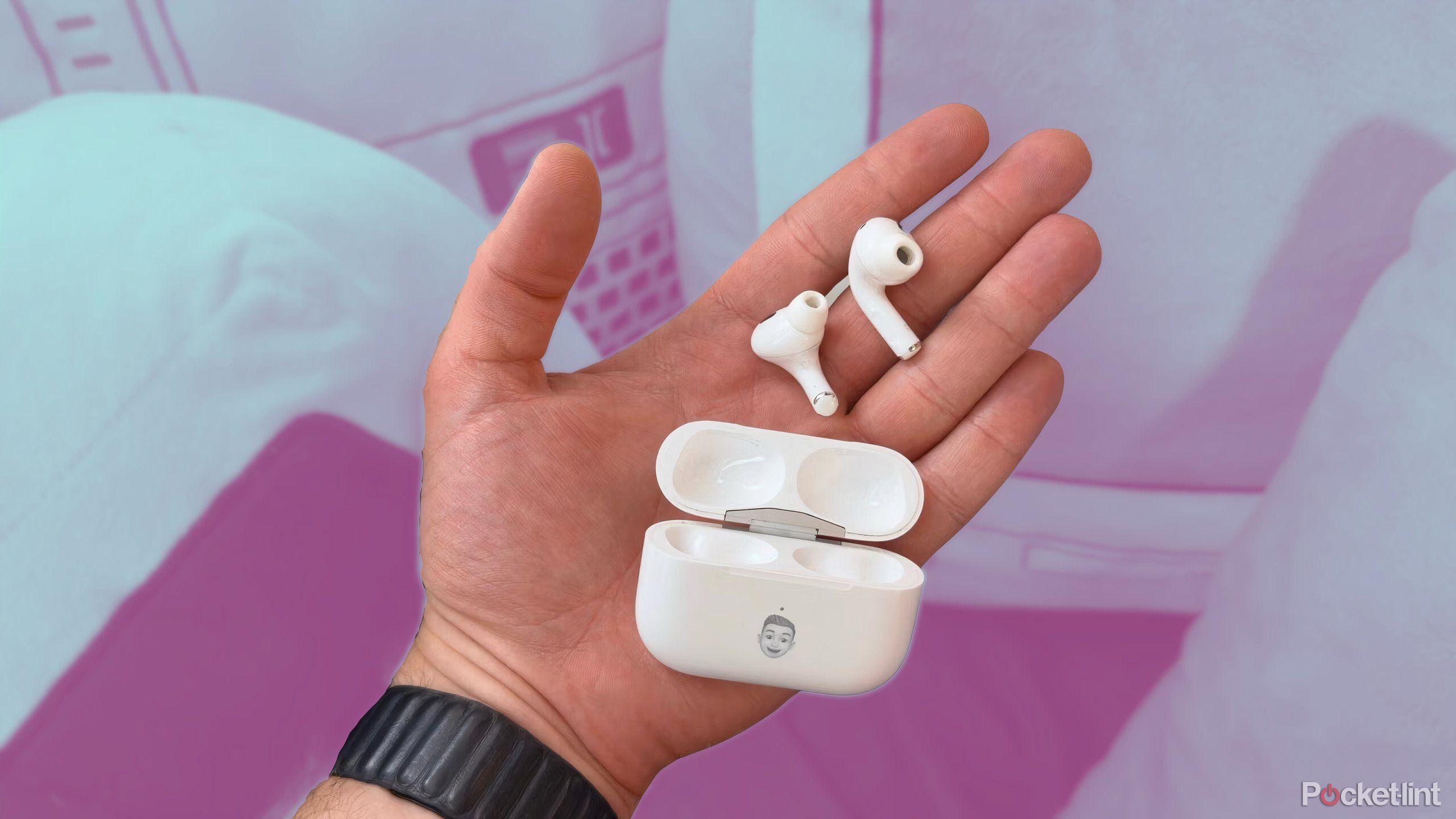 A pair of AirPods Pro laying in a person's hand.