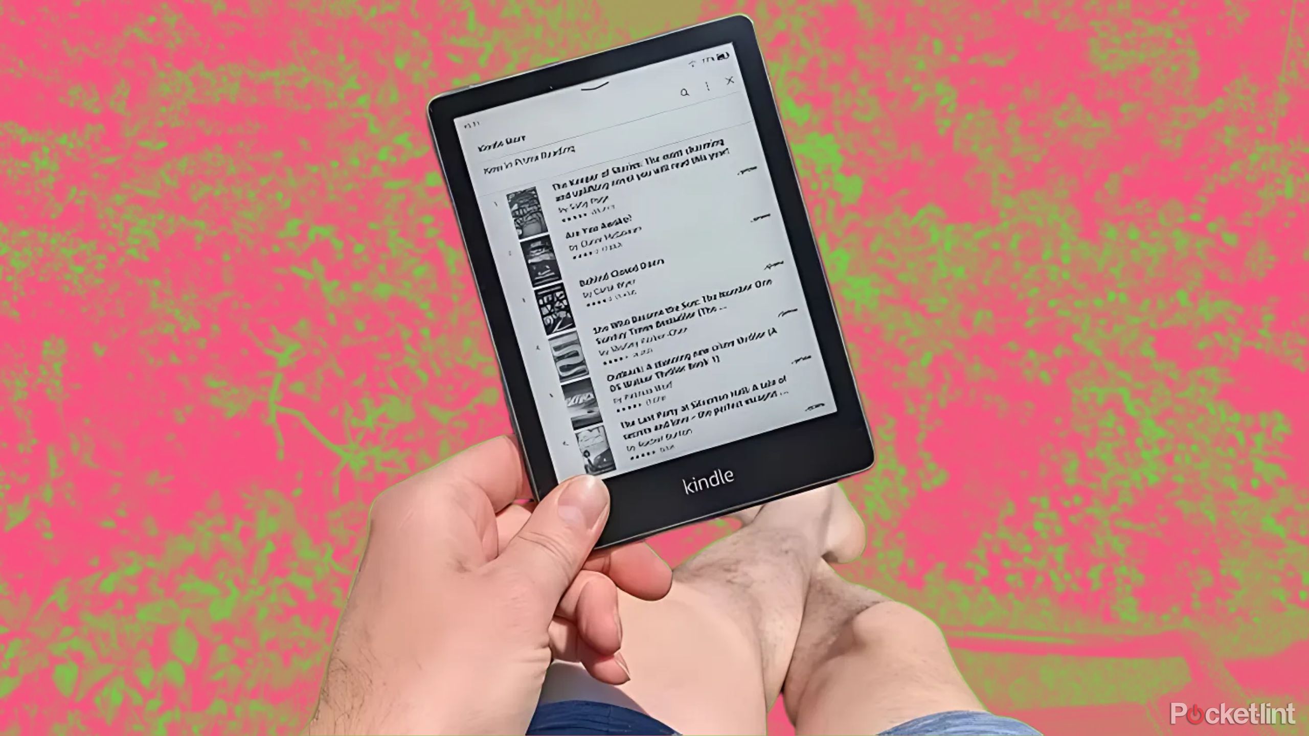 A person reading on a Kindle Paperwhite. 