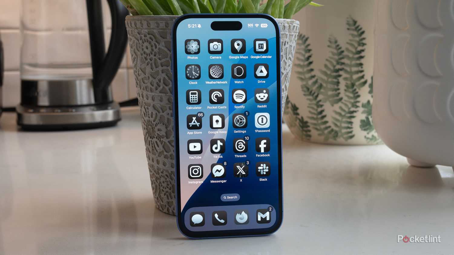 The iPhone 16's icons tinted blue.