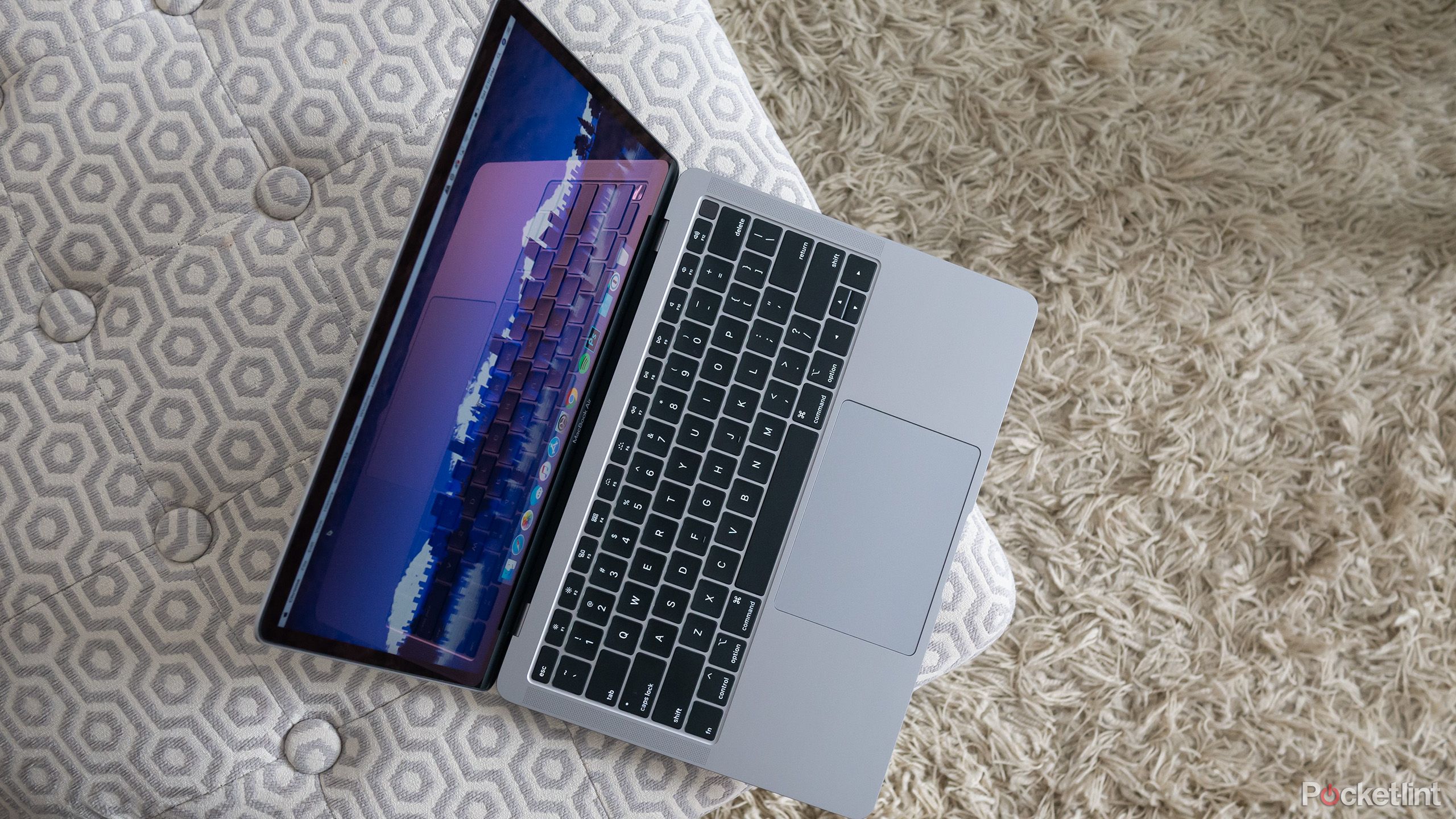 MacBook Air Butterfly keyboard sitting on a pillow. 