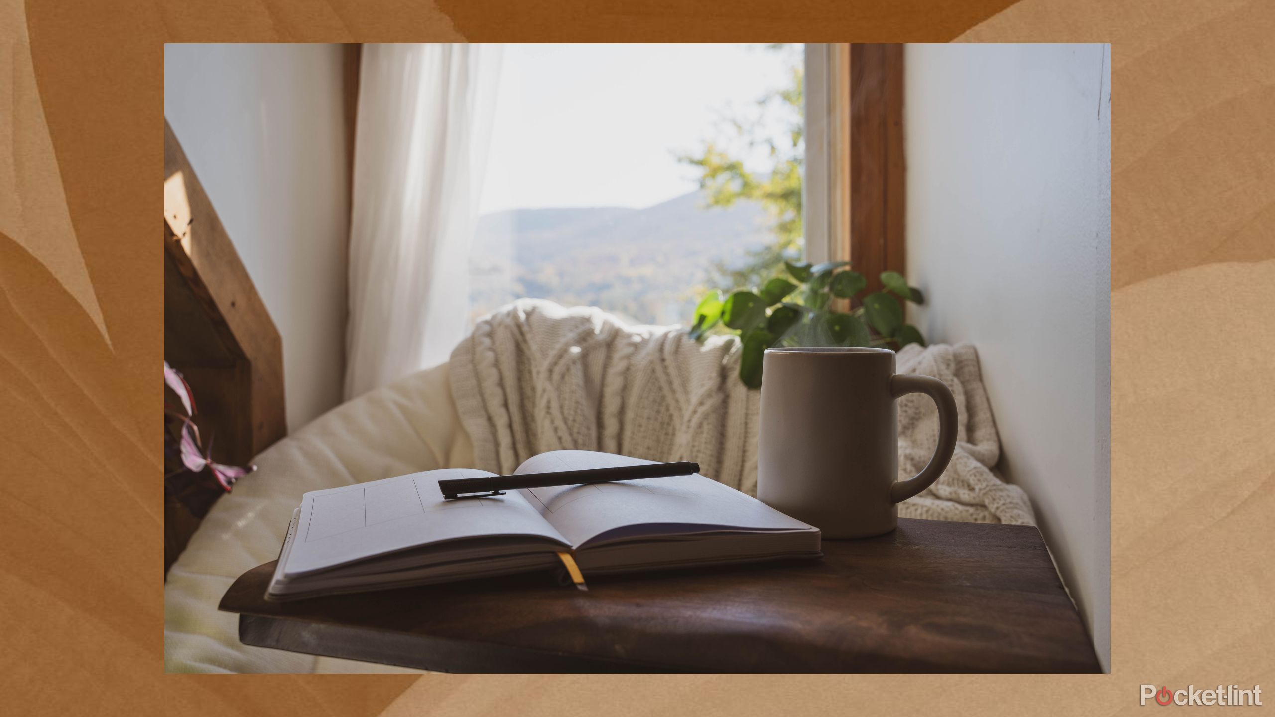 Journal with pen and mug. 