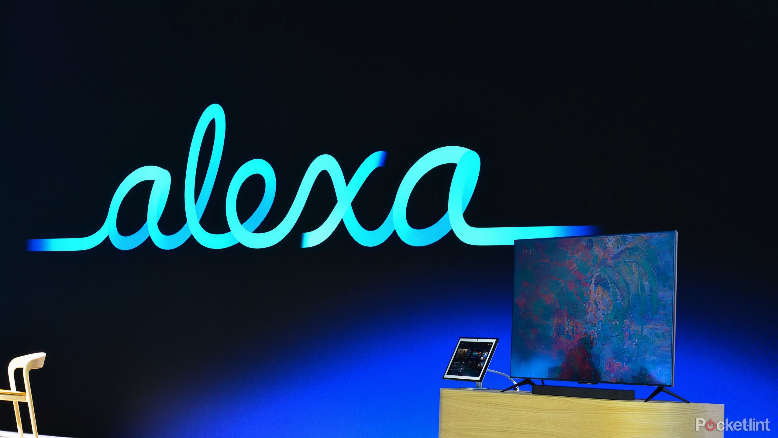 Alexa in neon blue cursive letters. 