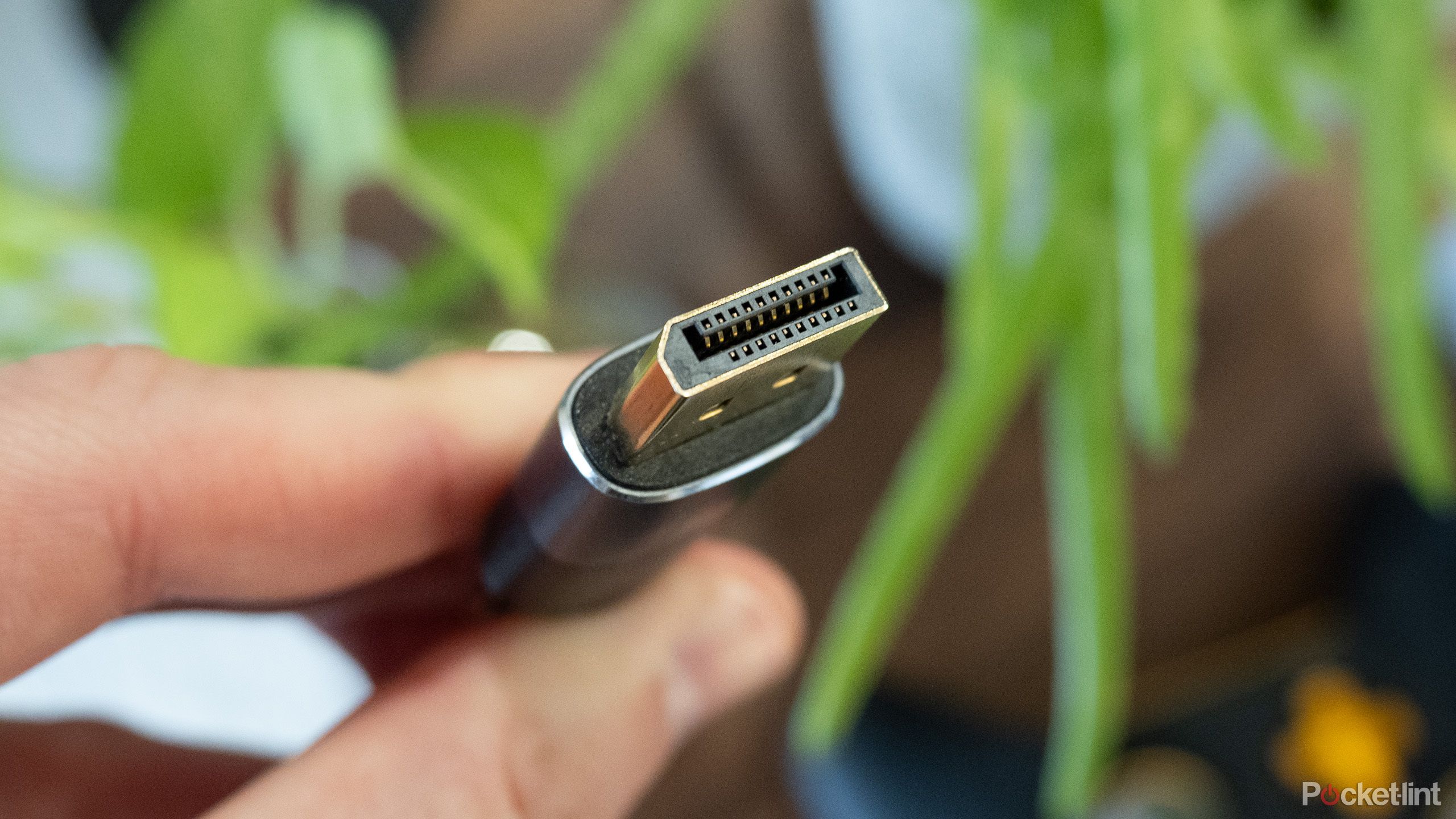 Display Port cable being held