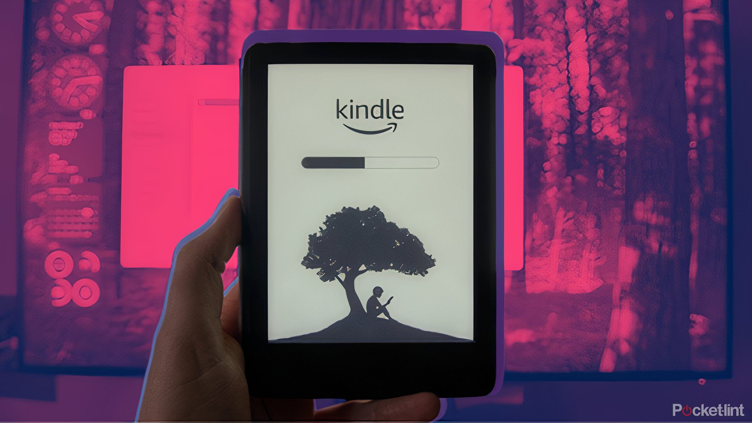 A hand holding a Kindle with a loading bar over a dark red background.